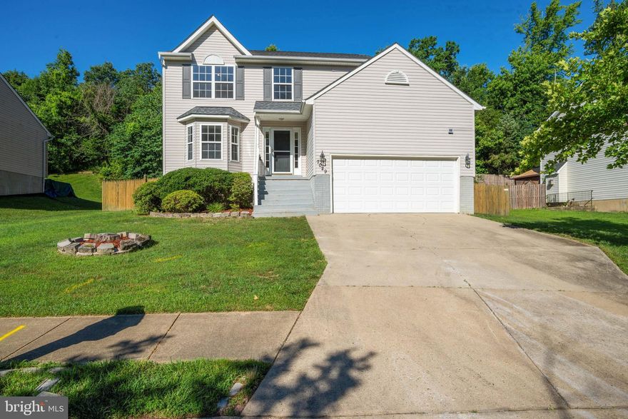 Great 3 level home with over 2200 square feet of finished space.  Open floor plan on the main level.  The kitchen is open to the family room with gas fireplace.  Nice size bedrooms on upper level to include large primary bedroom with full bath and walk in closet.  Primary bath has soaking tub, sep shower and dual sinks.  Fresh paint throughout.   Finished Basement provides a possible 4th bedroom.  Enjoy your summer on the deck in the private, fenced yard.   Gas strove and fireplace. All new kitchen appliances.  Backs to woods.  Minutes to the National Harbor and Beltway. Seller is including a one year home warranty.