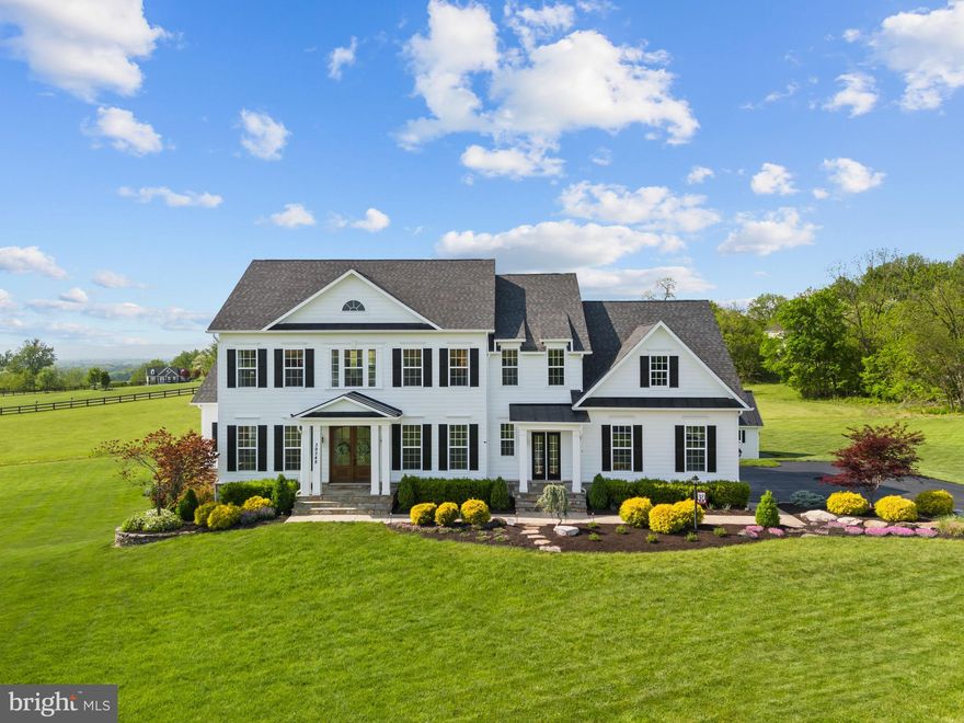 Listed BELOW Appraised Value. Experience luxury in this stunning Leesburg, VA estate, nestled on 6.86 acres with no HOA, this home blends countryside charm with convenient access to shopping, dining, wineries and more. The grand foyer ushers you into a world of sophistication and elegance. The expansive 6,986 sqft layout features a custom kitchen, a private office, and a main level crafted for distinguished living. Upstairs, oversized bedrooms, highlighted by a primary suite with a splendid ensuite bathroom boasting opulent finishes. The fully finished basement offers ultimate entertainment featuring a rec room, two guest bedrooms, a full bathroom, and a kitchenette ideal for hosting. A home theater and gym ensure every moment at home is a luxurious experience. Outside, enjoy breathtaking mountain views, and expansive grounds with endless possibilities for equestrian activities. 250 acres of farmland across the road is in a conservation easement, it will not be developed. This extraordinary home is a rare opportunity to own a piece of luxury where the tranquility of countryside living meets modern convenience.