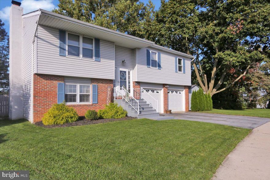 Come see this well maintained Bi-level home In the sought-after Wilson School District, known for its reputable education system and desirable neighborhood. The home sits on a large lot with a partially fenced rear yard. There are 2 parcels, one the home sits on that is .30 acres and an additional .10 lot that provides a wonderful opportunity for gardening, outdoor activities, landscaping and extra privacy.  The main level offers a  large living room, an update kitchen , three nice sized bedrooms and a lovely dining room area. The lower level offers additional living space with a wonderful  family room with a cozy fireplace, or you could use it as a home office. It  also includes a laundry room, another bathroom, storage space, and access to the garage and back yard. Call for your private showing today.