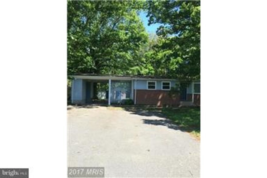 Cute 3 bedroom 1 bath home with a large yard close to I 95, Rt. 1, Cosner corner and commuter lots.  Beautiful dark floors through out.  2 sheds in the backyard to give plenty of storage.  Washer and dryer included "as-is"  Large paved driveway for plenty of parking and one car carport.