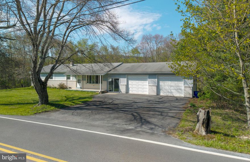 Welcome Home! To your dream country retreat in Perry co.  This spacious 5-bedroom, 2-bath Ranch Rambler sits on 1.39 acres, offering the perfect blend of peaceful countryside and convenient access to town.  Inside you'll find updates throughout. New carpeting and freshly painted walls, making it truly move in ready.   Spacious layout includes a large living room, dining and kitchen for entertaining. Full size basement with wood stove has been dry locked and could easily be finished to add to your living space. Updated Electric. Oversized 2 car garage (30W x 29D) with 2 garage door remotes, provides ample room for vehicles and projects. Step outside to a serene backyard, with a gentle stream and wildlife, or relax in the enclosed breezeway with sliding glass doors. Property may NOT need flood ins. talk to your lender.  Don't miss your chance to see this beauty, schedule your showing today!