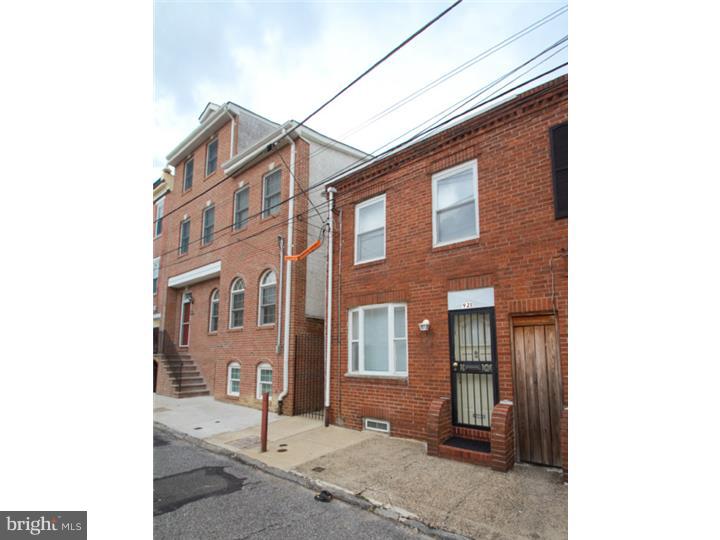 Nestled in the heart of Passyunk Square, right off the Italian Market is this 2 story, 2 bedroom, 1.5 bath perched on a quiet one way block-- the only block of Ernest St in the entire city! Enter into the living room with large window and pergo flooring. Kitchen offers wood cabinetry, white countertops, stackable washer & dryer (installed in 2011) and a door to the backyard- perfect for grilling or entertaining friends! Conveniently located first floor rear half bath with 2 windows. On the second floor you'll find two bedrooms with nice light and one even offers a large built-in closet, perfect for all your clothes! Full bath off the hall. Basement is clean, dry and perfect for storage! Brand new sewer line and a Bradford White hot water heater and Weil-McLain gas hot water heater, both installed in 2011. Located in the white hot booming Passyunk Square area, close to shopping, restaurants, parks, coffee shops, Center City... a very exciting area! The perfect home for a first time buyer, or an investor looking for a great turnkey rental property! An unbelievable buy!