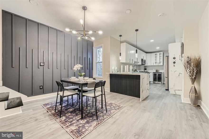 Experience the epitome of luxury living in this meticulously renovated townhouse, set to impress with its stunning transformation completed in 2025. This exquisite property, originally built in 1912, has been thoughtfully updated to blend timeless charm with modern elegance, creating a warm and inviting atmosphere that feels like home. Step inside to discover a spacious layout that boasts four generously sized bedrooms and two and a half beautifully appointed bathrooms. The fully finished basement offers additional living space, perfect for a cozy family room, home office, or entertainment area. Every corner of this home has been designed with high-end finishes and attention to detail, ensuring a lifestyle of comfort and sophistication. The traditional architectural style is complemented by classic brick construction, providing both durability and aesthetic appeal. Natural light floods the interior through thoughtfully placed windows, enhancing the inviting ambiance throughout the home. The open-concept living areas are perfect for entertaining, while the well-appointed kitchen features top-of-the-line appliances and luxurious countertops, making meal preparation a delight. Outside, the property is situated in a vibrant neighborhood, offering the convenience of on-street parking and easy access to local amenities. While there is no pool, the surrounding community provides ample opportunities for outdoor activities and social gatherings, fostering a sense of connection and belonging. This home is not just a residence; it's a lifestyle. The exclusive features and renovations elevate everyday living, making it a sanctuary for relaxation and enjoyment. Whether you're hosting friends for dinner or enjoying a quiet evening at home, this property provides the perfect backdrop for creating lasting memories. With its prime location and luxurious updates, this townhouse is a rare find that combines the best of both worlds: historic charm and modern convenience. Don't miss the opportunity to make this exceptional property your own and embrace a lifestyle of elegance and comfort.