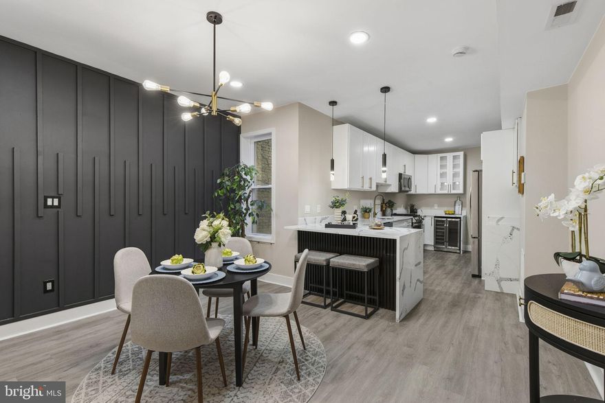 Experience the epitome of luxury living in this meticulously renovated townhouse, set to impress with its stunning transformation completed in 2025. This exquisite property, originally built in 1912, has been thoughtfully updated to blend timeless charm with modern elegance, creating a warm and inviting atmosphere that feels like home. Step inside to discover a spacious layout that boasts four generously sized bedrooms and two and a half beautifully appointed bathrooms. The fully finished basement offers additional living space, perfect for a cozy family room, home office, or entertainment area. Every corner of this home has been designed with high-end finishes and attention to detail, ensuring a lifestyle of comfort and sophistication. The traditional architectural style is complemented by classic brick construction, providing both durability and aesthetic appeal. Natural light floods the interior through thoughtfully placed windows, enhancing the inviting ambiance throughout the home. The open-concept living areas are perfect for entertaining, while the well-appointed kitchen features top-of-the-line appliances and luxurious countertops, making meal preparation a delight. Outside, the property is situated in a vibrant neighborhood, offering the convenience of on-street parking and easy access to local amenities. While there is no pool, the surrounding community provides ample opportunities for outdoor activities and social gatherings, fostering a sense of connection and belonging. This home is not just a residence; it's a lifestyle. The exclusive features and renovations elevate everyday living, making it a sanctuary for relaxation and enjoyment. Whether you're hosting friends for dinner or enjoying a quiet evening at home, this property provides the perfect backdrop for creating lasting memories. With its prime location and luxurious updates, this townhouse is a rare find that combines the best of both worlds: historic charm and modern convenience. Don't miss the opportunity to make this exceptional property your own and embrace a lifestyle of elegance and comfort.