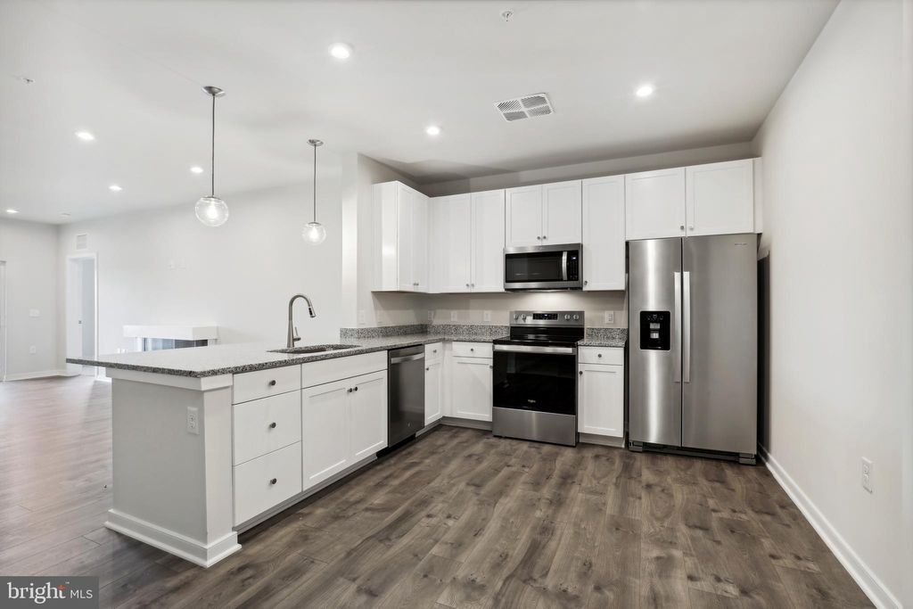 Photo of 750 Mount Airy Terrace NE #304, LEESBURG, VA 20176 (MLS # VALO2109338)