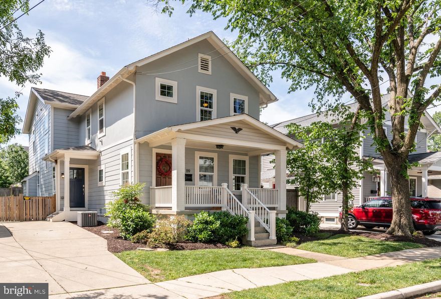 Gorgeously updated and expanded farmhouse in the heart of Del Ray! Full renovation completed in 2018, this home has all the charm mixed with modern amenities for comfortable and easy living. The large front porch invites you into this 5 bedroom, 4 1/2 bath home with over 3,550 square feet across three finished levels. Enter into the foyer and into a sunny living room that flows into a formal dining room, currently used as a home office. A mudroom with a separate entrance off the (4 car!) driveway makes an easy drop-off for backpacks and shoes. Adjacent to the mudroom is a large powder room adorned with shiplap walls, a modern vanity, and brass accents. Warm wood floors and tall ceilings carry you into the heart of the home featuring a huge family room with a gas fireplace and shiplap accents, and an incredible gourmet kitchen. Enjoy the clean and crisp finishes, white quartz countertops and shaker cabinetry, Thermador appliances, and an oversized island with a farmhouse sink. Entertaining is a breeze in the great room that easily flows out the French doors and onto the stone patio and professionally landscaped, fully fenced yard! This spacious home features 4 bedrooms upstairs, including 3 full bathrooms and laundry. A shiplap wall accents the sun-drenched primary bedroom, with a walk-in closet, and gorgeous marble ensuite featuring a double vanity, chrome accents, and large shower. Walk down the hallway on the original refurbished farmhouse wood floors and find 3 bedrooms and 2 hall bathrooms. The lower level is completely finished and includes incredible storage! The 5th bedroom with full bathroom is perfect for an au pair suite or private guest retreat. A recreation room with wet bar and additional living space offers a great space for a den and a playroom. Home is more important than ever, and this one has everything you need and more! Anchor yourself in the heart of Del Ray, and live a quarter of a mile to the new Potomac Yard metro stop! Steps to shopping, restaurants, Farmer's Market, and easy access to the airport, D.C. and more!