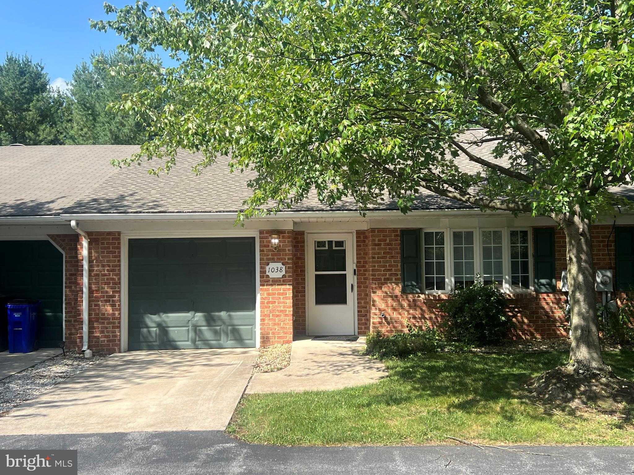 Welcome to this charming brick townhome located in the desirable north end of Hagerstown. This beautifully maintained, single-level home offers two spacious bedrooms and two full bathrooms, making it ideal for comfortable, accessible living. Inside, you’ll find a thoughtful layout designed for ease and convenience, while outside, the property features a one-car garage and a concrete driveway for ample parking. The backyard provides a peaceful retreat, partially enhanced with patio pavers to create a perfect spot for relaxing or entertaining. A standout feature of this home is the recently replaced roof—less than a year old—with durable architectural shingles offering both style and longevity. Combining low-maintenance brick construction with modern updates, this home is ready for you to move in and enjoy.
