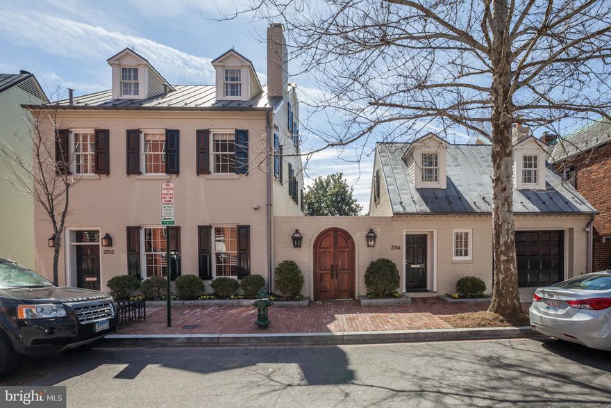 Spectacular renovation of this stately federal dating back to 1826 on nearly a 1/4 acre of formal private grounds. The property offers a lot of flexibility with custom timeless finishes throughout. The main house has 3 bedrooms, 2 Full bath and 2 powder rooms. The Carriage house has a Full Kitchen, 2 Bedrooms and 2 Full Baths. It is ideal for an in-law suite and/or home Office or Rental. The Total square footage of both houses is 4,400 sq. ft. surrounded by plush grounds. 1 car GARAGE! 3512-3514 P Street  addresses-two tax bills