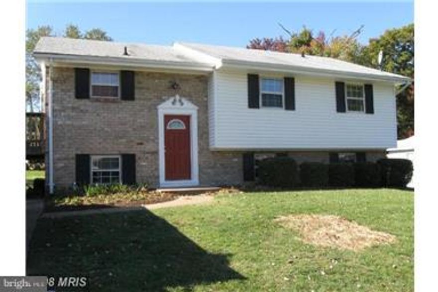 Priced to Sell>>Sold As-IS. New Carpet, Freshly Painted. Large bedrooms with mirrored closet doors. Family room with wood burning stove and slider to walk-out level back yard. Very roomy home with loads of storage space. Newer gas heating system and central air. Gas cooking. Nice side porch for entertaining. Eat in Kitchen.