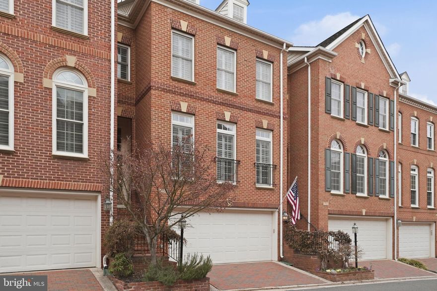 Nestled in the charming enclave of Old Town Greens, this elegant Colonial townhome offers a seamless blend of timeless architecture, modern comfort, and refined living. Built in 2000 and meticulously maintained, the residence features four spacious bedrooms and four and one-half beautifully appointed baths across thoughtfully designed living spaces.
Step inside to a warm, inviting interior where a cozy fireplace anchors the main living area. The open-concept layout flows effortlessly, creating the perfect balance between comfortable everyday living and sophisticated entertaining. Expansive windows bathe the home in natural light, enhancing its bright and welcoming ambiance.
The gourmet kitchen is designed to impress, showcasing premium Bosch appliances, generous counter space, and an intuitive layout ideal for both casual meals and culinary creations. Just beyond, the dining area opens to a private rear deck with picturesque community views — an ideal setting for morning coffee or evening gatherings.
The luxurious primary suite serves as a private retreat, complete with a spa-inspired en-suite bath featuring modern fixtures and refined finishes. Two additional bedrooms and a spacious full bath complete the second level, while the top floor offers a private fourth bedroom with its own full bath — perfect for guests, a home office, or an au pair suite.
Residents of Old Town Greens enjoy exceptional community amenities including an outdoor pool, tennis courts, and tot lots, providing abundant opportunities for recreation and relaxation. A two-car attached garage adds convenience and security, while the manageable 0.04-acre lot allows for low-maintenance living without sacrificing outdoor enjoyment.
Ideally located near the shops, dining, parks, and waterfront charm of Old Town, this home offers not just a residence, but a lifestyle defined by community, accessibility, and understated luxury.
This is an exceptional opportunity to own a beautifully appointed home in one of Alexandria’s most desirable neighborhoods.