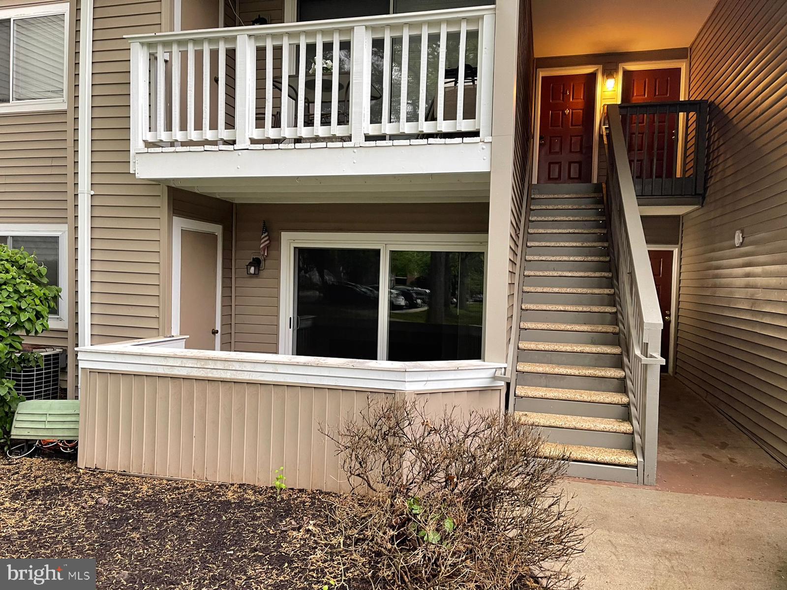 Great one bedroom condo conveniently located on ground level, featuring a fireplace and private patio. Newly Painted with new Hardwood flooring in living and dining rooms, granite counters in kitchen, new vanity and tile flooring in bathroom. Washer and dryer in unit, rent includes water, access to community pool and reserved parking spot.