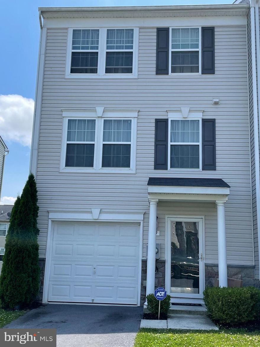 This home has it all and low maintenance. End unit with 2600 sq ft living space. No wasted space here. The hot water heater is new as of February this year. The home has an American Home Shield warranty which the seller would like to transfer to the buyer if possible. ADT supplies security and the seller is happy to assign this to the buyers as well. All 6 yes, 6 tv brackets stay. The home has been well maintained over the years. It has all the bump outs Dan Ryan offered. The color scheme is neutral, moving in is easy and the mail box is right next to the drive way. On site parking for 3 cars and then the lot for overflow is at the end of the street. Walking distance to elementary and middle schools. Close to Shopping and priced right. If you are looking for all the convenience and space of a single family home without the price tag and maintenance you just found your next home.