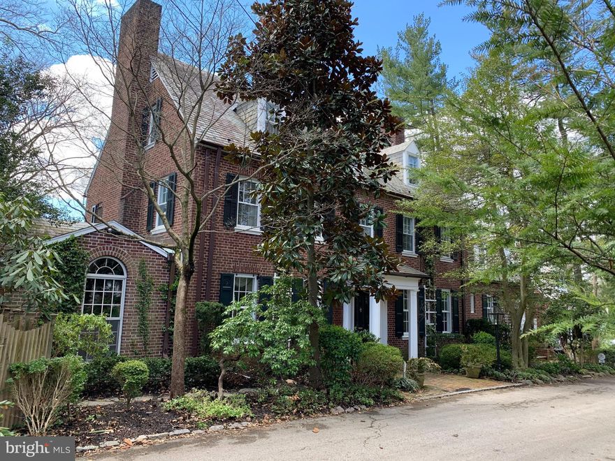 Exuding a prevailing sense of graciousness throughout, this classic brick Georgian has been lovingly maintained by its present owners. Across the threshold you are welcomed into the graceful center hall distinguished by a handsome faux painted floor. Beyond, tall French doors open onto a hand-laid brick terrace, gardens, outdoor dining and a refreshing pool. This area is easily accessed from the charming library with vaulted ceiling and custom bookshelves. It is also steps away from the soaring, sun-splashed, open-beamed family room, whose floor-to-ceiling windows encourage communication with the outside. The pristine kitchen with its white marble counters features a Sub-Zero refrigerator, a Bosch dishwasher, a six burner Thermidor gas stove, a central serving/eating island and a cozy breakfast room. Outstanding features of this elegant home include: Palladian windows, arched doorways, custom hardwood floors, three fireplaces, extraordinary flow from almost every ground floor room, site designed to maximize sun exposure, convenient back stairs to the second floor, a master suite with ensuite bath and adjoining dressing rooms, four additional bedrooms and three  bathrooms, and a three story turned staircase. All this is ideally located in a wonderful neighborhood within walking distance to Suburban Square shopping and dining, and the Septa R5/Amtrak train line in the heart of the Main Line..."Fox Hollow" is truly a treasure!