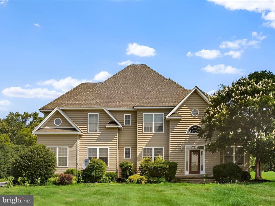 New Price Improvement**Come and take a look at this charming Colonial-style home, built on a very spacious 1.01-acre lot. Come inside and find the living area with a cozy fireplace and lots of natural lighting coming from the huge window. Next to it is the eat-in kitchen that boasts an island, complemented by modern appliances including a refrigerator, microwave, electric oven/range, and dishwasher. There is also a formal dining area, a sunroom and a laundry area. There is a main level bedroom as well as a full bathroom, and 3 more bedrooms on the second level. The primary bedroom offers a walk-in closet and a full bathroom. Outside, the property features a well-maintained front and rear yard, along with a deck for outdoor gatherings. Parking is a breeze with a side-entry attached garage and driveway. This home combines modern amenities with a serene setting, making it an ideal choice for those seeking a peaceful retreat. To help visualize this home’s floor plan and to highlight its potential, virtual furnishings may have been added to photos found in this listing. Come and schedule your showing now!