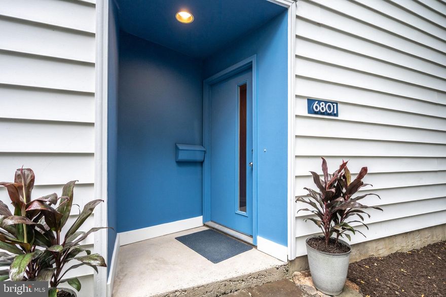 **Architect designed, light filled and energy efficient contemporary home in the sought after Greenway Downs neighborhood**      This unique home provides simple living in a city location with a private setting. Enjoy a detached  home living  for a town home price! No HOA, No shared walls, No parking problem, No hassles!   The home has 3 bedrooms with a 4th bedroom that can also be used as an  office.  **The upper level open floor design with a vaulted ceiling creates a captivating play of light throughout the upper level. Windows on all sides of the space bring in the light all day long and provide treetop views. The screened-in porch is perfect for al fresco dining and relaxing, and the glass door in the office gives access to the deck overlooking the wooded yard. The great room includes a fireplace, dining area, galley kitchen with new frig and stove, new quartz counters.  Just off the great room separate office/4th bedroom, and a powder room. **The ground level includes 3 bedrooms with spacious closets, full ceramic bath, laundry (washer/dryer 1 yr old) and utility closet with water heater and HVAC. **The interior of the home has new LVP flooring on both levels and the entire home is newly painted both inside and out. The custom-built shed in the rear yard provides additional storage. The wooded yard is truly a private island of tranquility in a bustling metro area. This sturdy, well insulated, all electric home was designed for minimal maintenance and maximum free time. Should the new owner decide to say goodbye to electricity bills altogether, the south facing roof was designed to accommodate a solar system. **Neighborhood Greenway Downs Park has a trail and tot lot. Cavalier Trail Park (1 block away) has a lit basketball court, 2 lit tennis courts (pickle ball), bike & hike trail, grills, benches and picnic tables, and play equipment. Enjoy the nearby shops, restaurants, and charming downtown Falls Church City, Whole Foods (1/2 mile), Harris Teeter, State Theater and more. One block to bus stop for East FC Metro (1.5 miles) & Ballston Metro, and heading west to Dunn Loring/Mosaic District and GMU. Welcome Home!