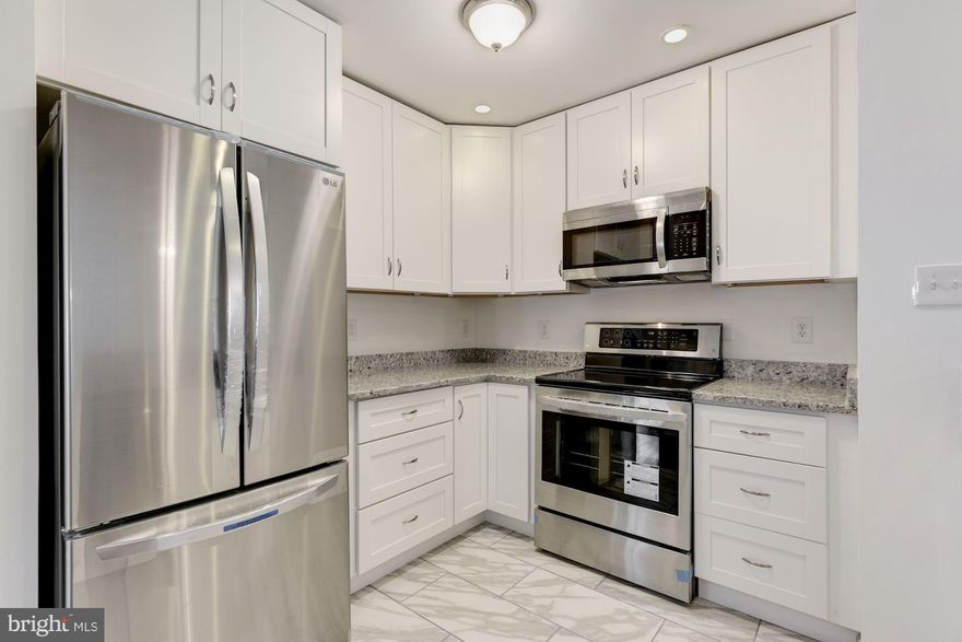 Fully Renovated One Level Condo; 2 bedrooms,1 Full Bath, Living Room & Dining Room with Wood Floors Throughout and New Kitchen Layout.  All New: Windows, Sliding Glass Door, Bathroom, Kitchen Cabinets, Sink, Appliances, Granite Counter Top & Electrical.  Assigned Parking.  FHA Approved Community.  ****Professional Pictures Coming Soon****