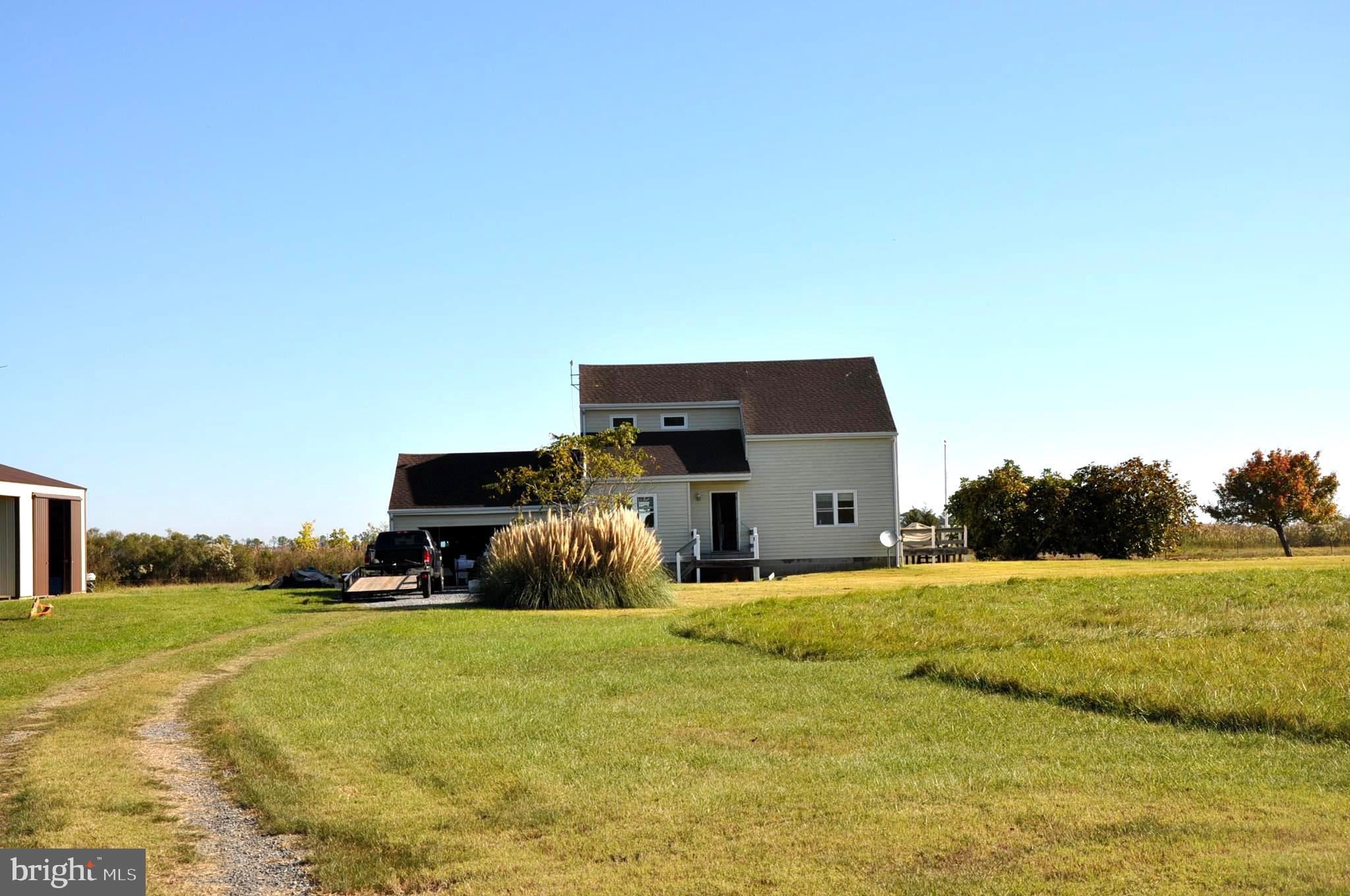 Approximately 88+/- acres of upland grounds and marsh - almost unheard of in the southern part of the county. 4500+/- Feet of Waterfront. The property has Excellent Waterfowl Hunting - Creek Front and Pond. Excellent Deer Hunting - Upland Grounds and Marsh - Sika. Tower Stands (5) will stay on the property. Deer Feeders (2) will stay on the property. Easy Canal access makes it conenient to launch boats and kayaks without leaving the property. Excellent water depth in Canal. Small Island in Goose Creek is a part of the property by deed and will convey. There are excellent improvements on the property, with Contemporary 3 BR and 2BA, main home with attached garage and detached pole barn for storage of boats, RV's, and ATV's. See Agent Remarks...... Multiple doors on the Pole Barn make for easy in and out of equipment and boats. Excellent Septic and Well. EASY ACCESS by Gravel Lane from County Road to Main Home. Sale Includes M109/P0004, M109/P0038, M109/P0053. Do NOT enter property without Listing Agent.