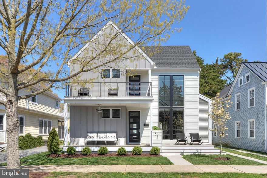 The renovated Maryland Avenue Farmhouse is a luxury home just over a block from the ocean and within walking distance to all of Rehoboth’s hot spots.  This modern farmhouse style home contains an open floor plan as well as large glass windows allowing for natural light to fill the home at any time of day.  
The 6 bedroom home has four and a half bathrooms that are each designed with different tile or marble floor to ceiling finishes.  The gourmet kitchen features a spacious walnut island with double quartz counter tops and high-end stainless-steel appliances.  The interior of this home was tastefully designed using a neutral color scheme, allowing for unique light fixtures and hardware as a well as the ability to incorporate pops of color.  
Whether you want to sit on the beach, shop, walk the boardwalk, dine on local fare or relax around the pool (option to heat) after a long day in the sun – this home serves as the perfect gathering place when you’re ready to relax.