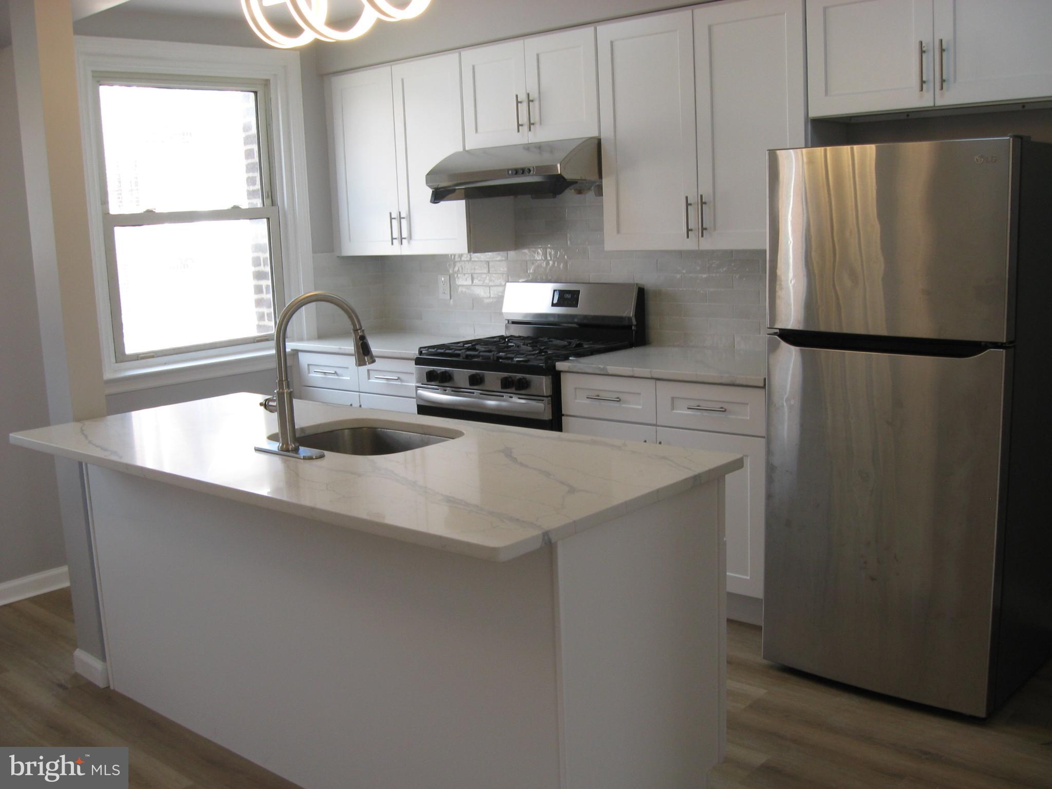 New Remodel House in Great Location. First floor offers living room, dinning room, eat-in kitchen, half bath for your convenience. Second floor offers three bedrooms and one full bath with skylite; Basement offers washer and dryer, garage has been transferred into one bedroom and living room, full bath.; Backyard could part two cars. Easy shopping, easy school, easy public transportation. It's a sweet home. Stop by to take a look, you will love it.