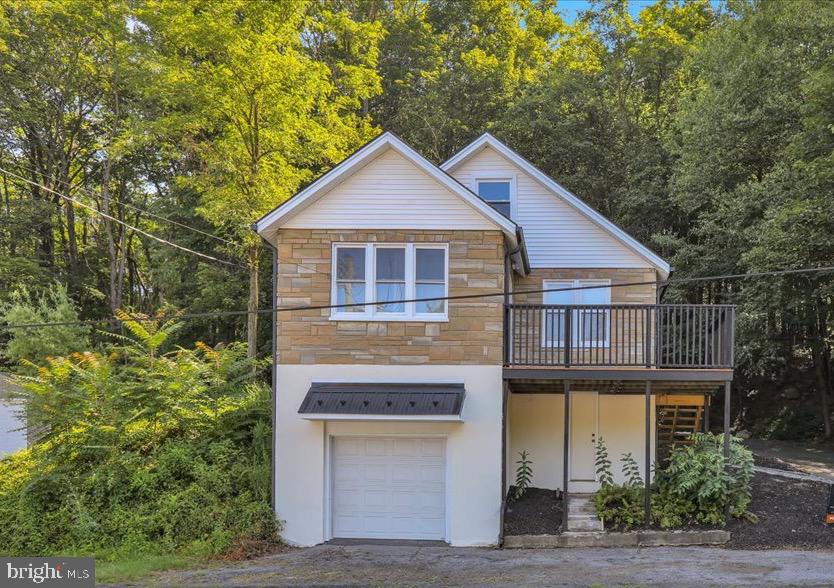 Fully Remodeled detached 3-Bedroom, 2-Bath Home in Blue Mountain School District & Move-In Ready!!
Perched on a hillside, this beautifully remodeled home offers the perfect blend of modern updates and natural charm. Nestled on a wooded lot, the home features a welcoming front deck—ideal for enjoying your morning coffee or evening sunset as well as a quaint back patio for privacy and ease of entry.
Inside, the first floor boasts a functional kitchen with granite countertops, soft-close cabinetry, and a cozy breakfast nook. The spacious living room provides plenty of space for relaxation, gathering or entertaining as well as additional space for a secondary dining option. There is even a convenient main floor bedroom and full bath complete for those looking for single floor living.
Upstairs, a massive second bedroom creates the perfect retreat, whether you need a primary suite, guest quarters, or an inspiring creative space.
Downstairs, the walk-out lower level adds even more flexibility, with a second living area, another bedroom with full shower bath, and a laundry area as well as garage access.
It’s everything you’ve been waiting for—and it’s ready for you now!
