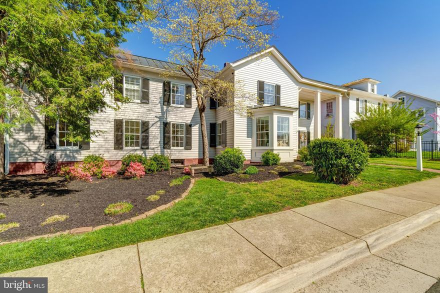 This house is STUNNING! Step into history with the Hixon-Arrington House, a timeless gem built in 1874. This charming home features covered porches that overlook a sprawling backyard, perfect for relaxing or entertaining. Inside, you'll find two elegant parlors, a spacious dining room that comfortably seats 14, a beautifully renovated kitchen, a cozy den, and a convenient powder room on the main level. The current owners completely redid the HVAC system removing the radiator and boiler system and allowing for modern usage. Upstairs, four generously sized bedrooms and two bathrooms offer ample space. Many of the original window panes, crafted on-site with blown glass, remain intact, adding to the home’s historic charm. Although the external, storm windows were just replaced in 2023. The home features a metal roof (one of the most durable).  The property also includes a two-car garage with a workshop and loft, a private fenced backyard, and a classic wrought iron fence with a gated entrance in the front. Nestled in the Old Town Manassas Historic District, this home is a rare opportunity to own a piece of the past with modern comforts. Just steps from boutiques, restaurants and the laid back vibe of downtown Manassas and steps from the VRE - don't miss the chance to call this beautifully, maintained home yours!