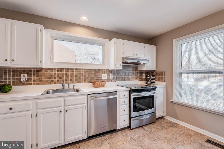 This quiet tucked away home has so much to offer.  3 bedrooms and 3 full baths with a 1/2 on the first floor.  Wood burning fireplace. Sliders to a fenced rear yard and walk outside to your parked car next to your home.  Big, 2nd floor bedrooms, each with a full bath.  Laundry is also on the Upper Level.  Lower level is finished and offers another full bath - this can be a 3rd bedroom, a game room or an office - it's up to you!  Located near the University of Maryland Hospital and campus.  Just a few blocks to Oriole Park and Ravens Stadium. Next door to the B&O Museum.  Easy access for commuters to 95, 295, 395,  RT 1 and the Camden Line Train and Light Rail.  HOA keeps up the gardens and lawn. Snow removal from the parking lots.  HOA COVERS THE WATER BILL EACH MONTH.