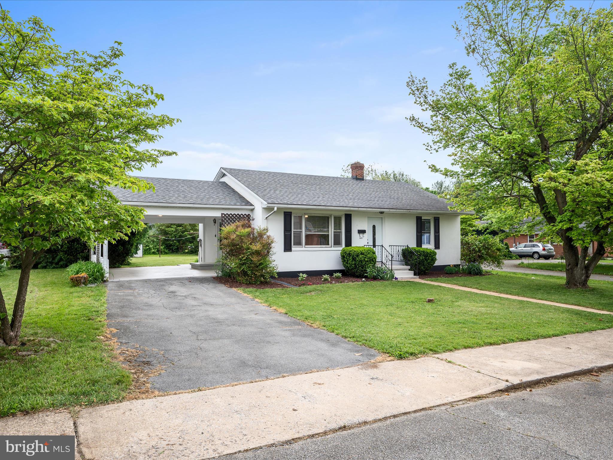 Charming Updated Rancher Near the Park! Welcome to this beautifully refreshed rancher with a partially finished basement, ideally located close to the park! This home combines classic charm with modern updates, offering comfortable living on the main floor while the basement features a spacious finished bonus room—perfect for a guest suite, home office, or media room—alongside a full bathroom for added convenience. Inside, enjoy fresh updates throughout, including stylish finishes, a bright, open layout, and an abundance of natural light thanks to numerous new windows. Stay cozy year-round with a newer heat pump that adds efficiency and comfort. Whether you’re relaxing indoors or exploring nearby green spaces, this inviting home has much to offer!