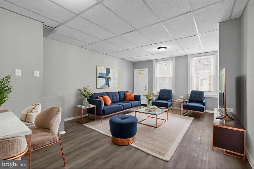 Welcome to this well-maintained 2-bedroom, 1-bath rowhome located in the Juniata section of Philadelphia which is situated near the Frankford boarder. This move-in-ready home offers a bright, open first-floor layout with new luxury vinyl plank flooring, newer windows, and a comfortable flow for everyday living and entertaining. The updated kitchen features new shaker-style cabinetry, quartz countertops, a classic white subway tile backsplash, and brand-new stainless steel appliances, including a gas range and built-in microwave. Just beyond the kitchen, you’ll find a private rear yard, perfect for outdoor enjoyment. Upstairs, the second floor offers two generously sized bedrooms with new wall-to-wall carpeting and a spotless full bathroom featuring a new toilet and vanity. Additional highlights include a gas hot-air heating system that is only a few years old, a brand-new hot water heater, and the added peace of mind of a one-year American Home Shield home warranty. Conveniently located near shopping, public transportation, and major roadways, this home is an excellent opportunity for buyers seeking an affordable and thoughtfully updated property.  SPECIAL FINANCING AVAILABLE! If qualified, you could own this home for $2,000 down and $1,000 a month!!