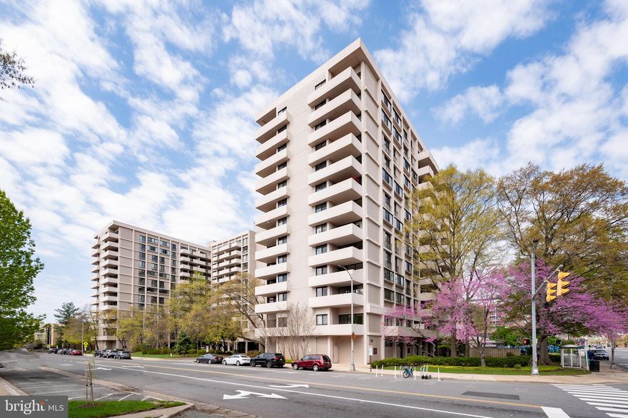 Price Reduction! This stunning and updated condo offers a spacious and modern living experience with tall ceilings and bamboo flooring throughout.  Remodeled kitchen has removed pantry to add additional custom cabinets and granite countertops, stainless appliances including gas range with dual ovens.  Bathroom has been beautifully remodeled.  The large primary bedroom with walls of windows, ceiling fan and features an oversized walk-in closet complete with built-in organizers, while a second walk-in closet in the entry provides even more storage. Expansive walls of recently replaced sliding glass doors fill the home with natural light and offer seamless access to an oversized balcony that overlooks the trees—perfect for entertaining or relaxing. Laundry is included with conveniently located laundry rooms on the same floor, and the condo fee includes all utilities. Garage parking is available for up to three cars at an additional monthly cost ($50 for one, $60 for two, and $70 for three), and extra storage is also available for a fee.

Residents enjoy a wide range of amenities, including a beautifully landscaped plaza with a 25-meter outdoor pool and sun-bathing areas, a community garden, and a private park featuring a strolling path, gas grills, gazebos, and picnic tables. There's also a bicycle storage area and a community club room equipped with a TV and pool table. The building provides top-tier services like front desk concierge, 24-hour security, and in-house maintenance. Located just minutes from Ballston Metro, the condo offers an easy commute to the Pentagon, downtown D.C., the Capitol, and Amazon Headquarters. Everyday conveniences are right next door with a Harris Teeter grocery store and pharmacy, and Target is just down the street. The Ballston Exchange shops, only two blocks away, includes Macy’s, Regal Cinemas, CVS, the Kettler Ice Center, salons, spas, restaurants, and boutiques. The building allows one cat and service dogs only.