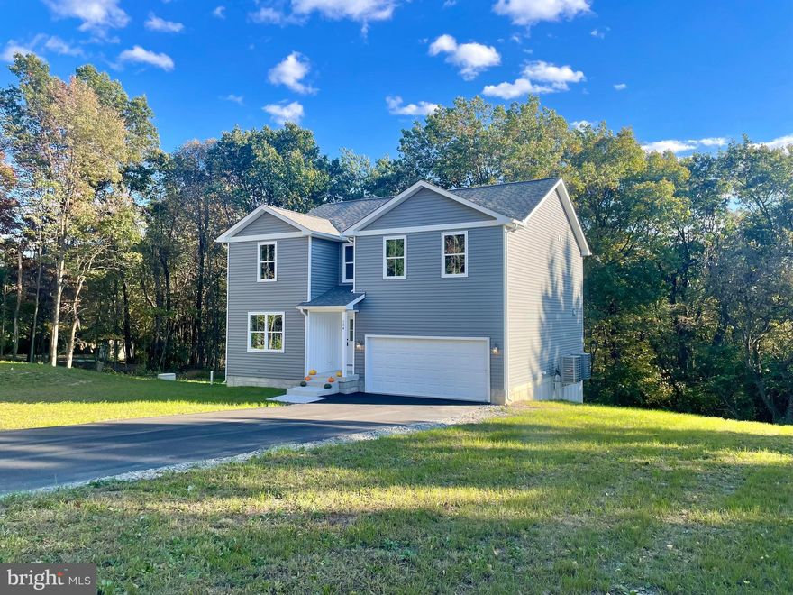 This gorgeous newly constructed home in East Penn Township, Lehighton is back on the market and priced to sell!
 This spacious home offers over 2,500 sq ft of finished living space above a full walk-out basement. The Sycamore model by 4 U Homes features an open floor plan with a living room, dining area, and kitchen, creating a welcoming space for entertaining. The kitchen has stainless steel appliances, granite countertops, soft-close cabinets and drawers, and sleek black hardware. The first floor includes a guest bathroom, flex room, or home office with ample natural light.
The 2nd floor offers a loft or playroom, three spaciously sized bedrooms, a full bathroom, a convenient 2nd-floor laundry room, and the master suite that is complete with a cathedral ceiling, master bathroom, and large walk-in closet.
Outside, this home boasts a 2nd story composite deck overlooking the tree-lined backyard creating natural privacy, on this 1-acre property. You'll enjoy the peaceful and private location while still only being a few minutes from shopping centers, healthcare facilities, and major highways.  All 4 U Homes come with an optional 12-year home warranty at no cost to the new homeowner. Call  to schedule a showing today and experience the  difference in buying a brand-new construction home.
Move in date as soon as tomorrow!