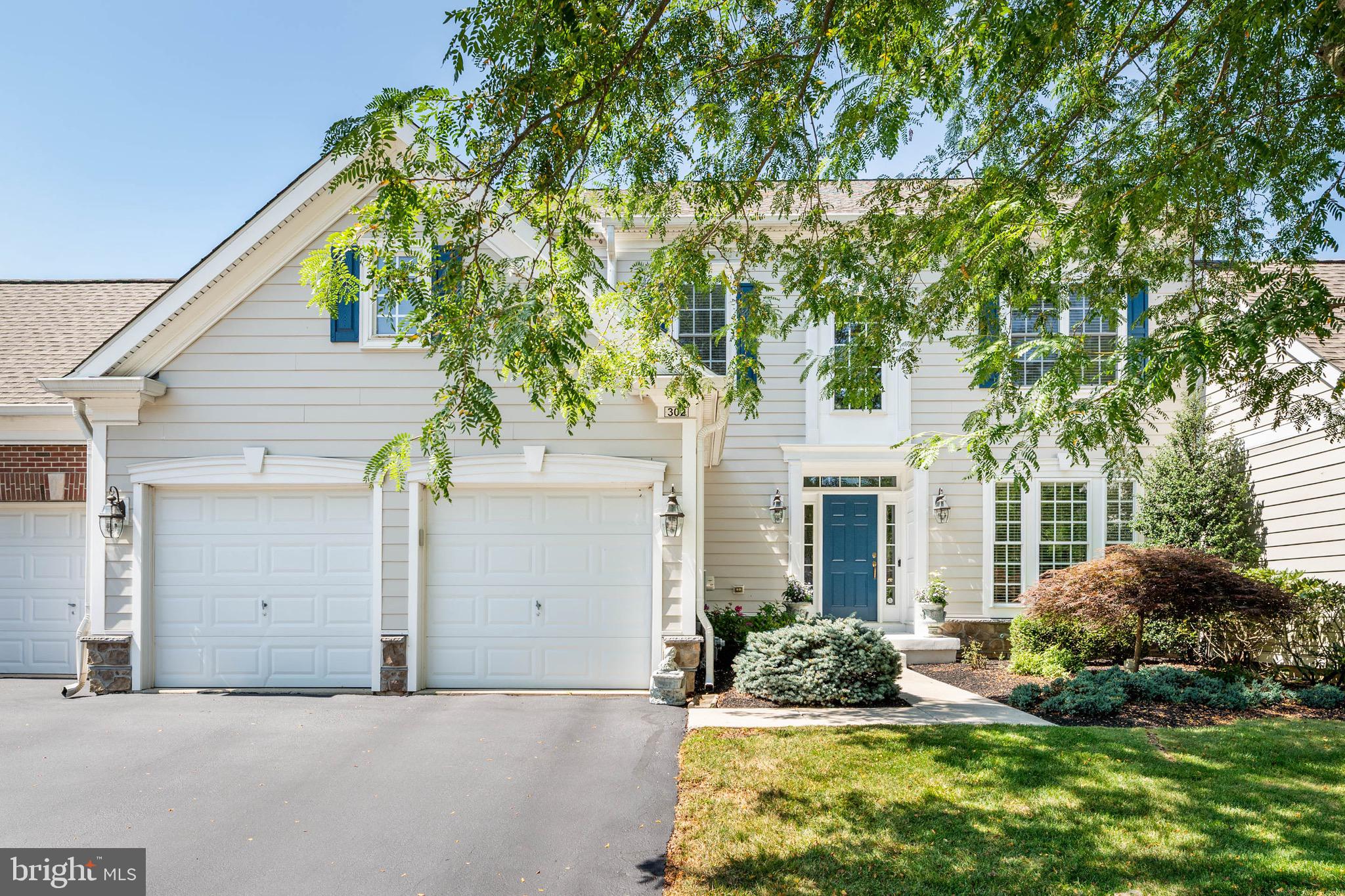 Turn the key to begin your next chapter in this elegant move-in-ready home! Whether you are looking to downsize or need room to grow, this elegant townhome offers a unique blend of comfort, space and versatility that fits seamlessly with a variety of lifestyles. Located in the desirable Springton Pointe Woods Community, this home makes a striking first impression with its beautifully landscaped entry, inviting front porch and classic exterior. Step inside to the dramatic two-story foyer, with an open floor plan, ideal for entertaining. Thoughtful architectural elements, including detailed millwork, nine-foot ceilings, wainscoting, crown molding and gleaming hardwood flooring, add warmth and sophistication. A formal living room is to your right and a spacious dining room to your left. A private study is located off the entry as is a powder room and coat closet. Straight ahead is the family room with a corner gas fireplace and wall of sun-filled floor-to-ceiling windows. The adjoining gourmet kitchen showcases beautiful quartz countertops and a herringbone patterned marble-tiled backsplash. The abundant cabinetry, large island and brand new appliances are every chef’s dream. Casual dining is a delight in the breakfast nook, enhanced by a built-in serving buffet and cabinets for added functionality.This area will surely become the hub of the house for all gatherings! Step outside onto the recently renovated, maintenance-free composite deck with integrated lighting in the porch railing, added for ambiance and safety. Generously scaled, the deck accommodates a dining table and chairs for eight, casual seating and a grill. Enhanced by a privacy wall and mature trees, this tranquil outdoor space creates a picturesque setting for enjoying summer evenings. A laundry room with a new washer and dryer, utility sink and storage closet is off the kitchen as is the convenient entry to the two-car garage. Upstairs, the luxurious primary suite offers a dedicated sitting area with a gas fireplace and built-in book/display cases, with a wall of windows. A tray ceiling and oversized walk-in closet elevate the space, creating a relaxing retreat you will look forward to at the end of the day. The ensuite bath is done in neutral tiles, featuring a soaking tub, double sink vanity, toilet room and shower stall. A hall bath with a tub and two other spacious bedrooms with generous sized closets are located on this floor, along with a hall linen closet. Neutral carpet is throughout the second floor. The finished basement is perfect for a media room, playroom or home gym. A fourth bedroom with a full-sized bathroom with a tub is a bonus. A separate space houses all utilities for the home which includes a newer dual-zoned HVAC system and hot water heater. There is ample space for storage. Living in Springton Pointe means no worries of lawn maintenance/landscaping, snow removal, trash removal and exterior maintenance. All are included with a reasonable monthly HOA fee. This home features a brand-new roof. You will be ideally located with convenient access to the vibrant shops, restaurants and hotels of Newtown Square and Ellis Preserve. Enjoy close proximity to major commuting routes and nearby destinations including West Chester, Media, and Paoli with easy access to the airport and Center City. Are you ready to make this turn-key home yours? Do not hesitate to make an appointment today!