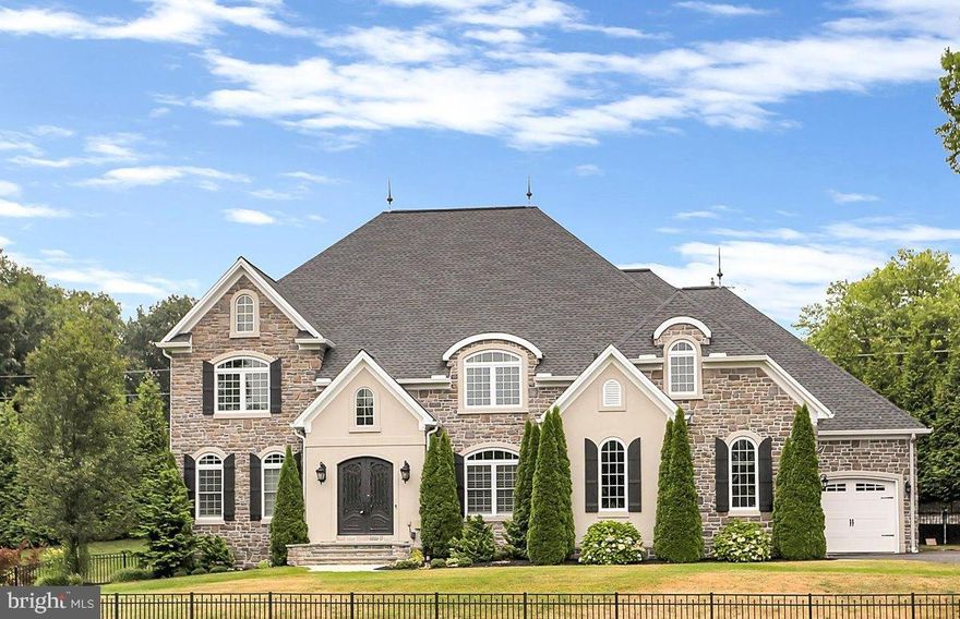 Nestled within the prestigious Pinehurst Hills community, 5000 Chloe Lane stands as a beacon of elegance and modern luxury. This custom-built masterpiece, constructed in 2016, spans nearly 7,000 square feet on a sprawling 2.85-acre lot, offering a lifestyle of unparalleled comfort and sophistication.

As you step through the grand entrance, the magnificent foyer sets the tone for what lies beyond. You're immediately drawn into an exquisite family room, where coffered ceilings and recessed lighting create a warm and inviting ambiance. The two-way fireplace, intricate molding, and an abundance of windows that flood the room with natural light complete this picture of perfection.

Adjacent to the foyer, French doors open to a large home office, providing a quiet and elegant space for work or study.

The heart of this home is the gourmet chef's kitchen, equipped with Viking appliances, an oversized oven, a 10-foot walnut island, marble countertops, a tiled backsplash, accent lighting, and a spacious walk-in pantry. Adjoining the kitchen are a formal dining room for hosting elegant dinners, an eat-in kitchen area for casual meals, and an additional family room featuring vaulted ceilings, built-ins, and a cozy fireplace.

Upstairs, you’ll find four bedrooms, each with its own full bathroom and walk-in closet. The primary suite is a sanctuary of luxury with tray ceilings, his and her closets, and access to a private covered patio. This serene space is the perfect spot to enjoy your morning beverage of choice. The en suite bathroom features a barrel-vaulted ceiling adorned with a chandelier, a large tiled shower, a free-standing bathtub, double vanities, and a private water closet.

The expansive finished basement offers a media room for movie nights, a full kitchen with everything you could need to entertain, an exercise room to maintain your healthy lifestyle, and a bedroom with an egress window and a full bathroom, adding versatility and convenience for guests or extended family.

Making your way out the lower level, you’ll find a third covered patio that leads to a breathtaking heated swimming pool. This outdoor oasis features waterfalls, fire features, a rock diving board, a built-in spa, and a fire pit, creating the ultimate space for relaxation and entertainment.

Throughout the home, hand-scraped hickory hardwood floors and vaulted ceilings add to the sense of grandeur, while a sophisticated Control-4 system ensures modern convenience. Additional features include a generator, fully fenced-in yard, second floor laundry room, Tiday construction, and exterior led lighting installed along the perimeter of the home that can be used annually as holiday lights or to show support for your favorite team on game day—all controlled from an app.​

Located within the Cumberland Valley School District, this home provides easy access to major highways and a wealth of shopping and dining options. It's not just a home; it's a sanctuary where luxury meets everyday living. Don’t miss your chance to own this exceptional residence!