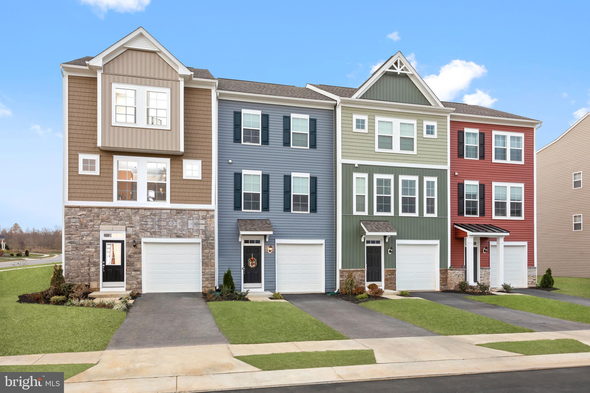 *OFFERING UP TO 10K IN CLOSING ASSISTANCE FOR PRIMARY RESIDENCE FOR PRIMARY RESIDENCE WITH USE OF PREFERRED LENDER AND TITLE.*
DECEMBER DELIVERY!! Come home to Berkeley County’s premier planned community featuring a clubhouse, swimming pools, walking trails, lush landscaping and mountain views. This beautiful end unit has an extraordinarily large yard at 5,378 sq. ft. This Bedford II 3 level townhome features a covered front porch with 1 car garage featuring 3 Bedrooms and 3.5 Baths. It is fully finished top to bottom. The front door leads directly into the spacious lower level including 9 ft. ceilings, foyer with a double coat closet, access to the garage continuing into the fully finished lower level recreation room with full bath and walkout access to rear yard with privacy fencing on both sides. Open concept main level with 9 ft. ceilings, luxury vinyl plank flooring throughout this level, dining room and kitchen with stainless appliances, large 8’ plus island, upgraded cabinets, quartz countertops and a boxed bay window at the rear. The kitchen leads directly into living room with a powder room. The primary suite includes a vaulted ceiling, a large walk-in closet and primary bathroom that has dual vanities with tiled shower with seat. Laundry is located on the bedroom level. Home and community information, including pricing, included features, terms, conditions, availability and sales procedures related to appointments subject to change without notice. All images are for illustrative purposes only and individual homes, amenities, features, and views may differ. Images may be subject to copyright.
