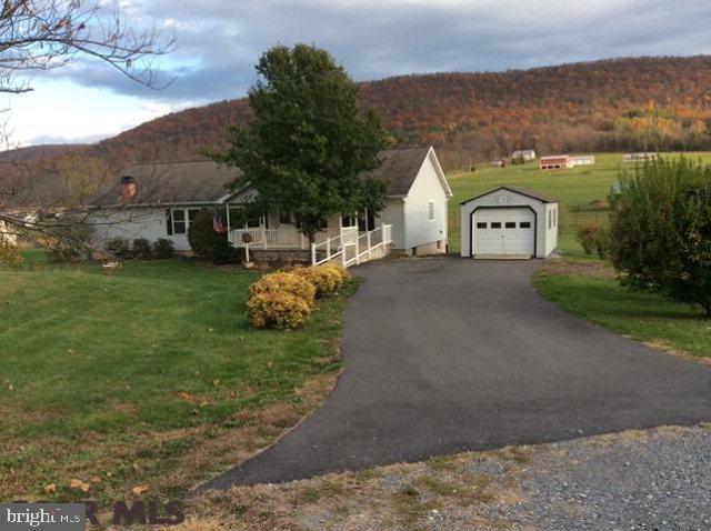 RARE OPPORTUNITY>>>Large, Spacious Ranch Home on 1.111 rural acre lot with Mountain Views on a Cul-de-sac dead end road , Bellefonte School District, Marian-Walker Elementary School, Propane Heat, Stove and On Demand Water Heater, Private Well, Onsite Sand Mound septic and flat large back yard, Private Covered Vinyl back deck, Large Covered Front Porch with Handicap concrete walk and ramp! You must come see this property for yourself!! A Motivated Seller and being Vacant make this home easy to tour! Call your realtor today for a showing. This Property will not last long on the market!! Home and Termite Inspections have been completed and are available upon request!!