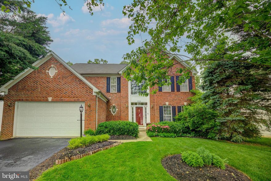 Elegant Brick front home designed in the Virginia Tradition.  Dramatic 2-story foyer featuring Palladian window and curved staircase .  Living room and Dining room with hardwood flooring, architectural columns and decorative crown and chair rail moldings.  Kitchen is the heart of the home with plenty of cabinet space and countertop workspace is gleaming granite.  Center island and stainless appliances finish off this gourmet space.  Sunny morning room opens to an expansive entertainment deck overlooking lush landscaped yard.  Even a sunny garden spot for to plant your favorite garden veggies.  The rear yard backs to the woods and the elementary ball fields for open space.  The family room features a cozy fireplace.  The Upper level offers a large primary bedroom and EnSuite bath with soaking tub, double sink vanity and updated shower with frameless glass doors.  Three additional bedrooms and hall bath w double sink vanity are on this level.  The lower level offers a complete private suite with full bath and plenty of closet space.  A media room offers space for the whole family to enjoy.  Walkout level to the fenced backyard.  Venture out into the Popular Ashland community which  has sidewalks and offers great walkability to the elementary school from this homesite.  Neighborhood amenities include swimming pool, tennis, basketball courts, Tot Lot and community center.  Shoppes, grocery stores, and restaurants are located so nearby.  Convenient upscale Stonebridge specialty shoppes including Wegmans, Firebirds, Alamo Cinema Draft House,  Starbucks and more.  Convenient to the area commuter lot and the hotlanes on Interstate 95.  Sought after Prince William County Schools--Forest Park Pyramid.  Recent updates including HVAC, HWH and Lawn  Sprinkler System.  Excellent Location, meticulous Condition ,and competitive Price team up here.
