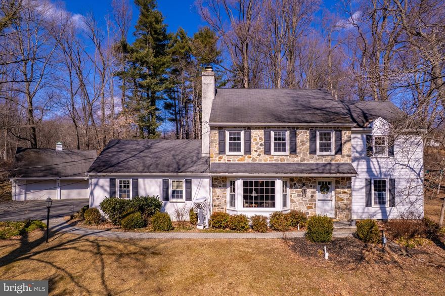 Welcome to 95 Mill Road, a beautiful, well appointed home on 2.77 acres.  It boasts 5 bedrooms, 3 full baths, with a large room with a full bathroom on the main level that could could be an in-law suite, office, or extra family room.  Large windows bring in all the natural light, making this a wonderful place to relax.  In addition, the main floor has a living room with wood fireplace for cozy nights in front of the fire.  The formal dining room just off the eat-in kitchen with a sub-zero refrigerator makes entertaining a breeze.  There is a den with a sliding door to the patio to complete the main level.  Upstairs you'll discover 4 spacious bedrooms and 2 full bathrooms with walk-up attic access.  The owners refinished the basement with a TV/playroom separate from the mechanicals.  There is propane forced air heat in the main house and a heat pump/AC throughout.  The sellers added a climate controlled work shop above the 2 car garage, perfect for all your projects!  Low taxes, West Chester schools, and close proximity to shopping and major highways makes this home a winner!