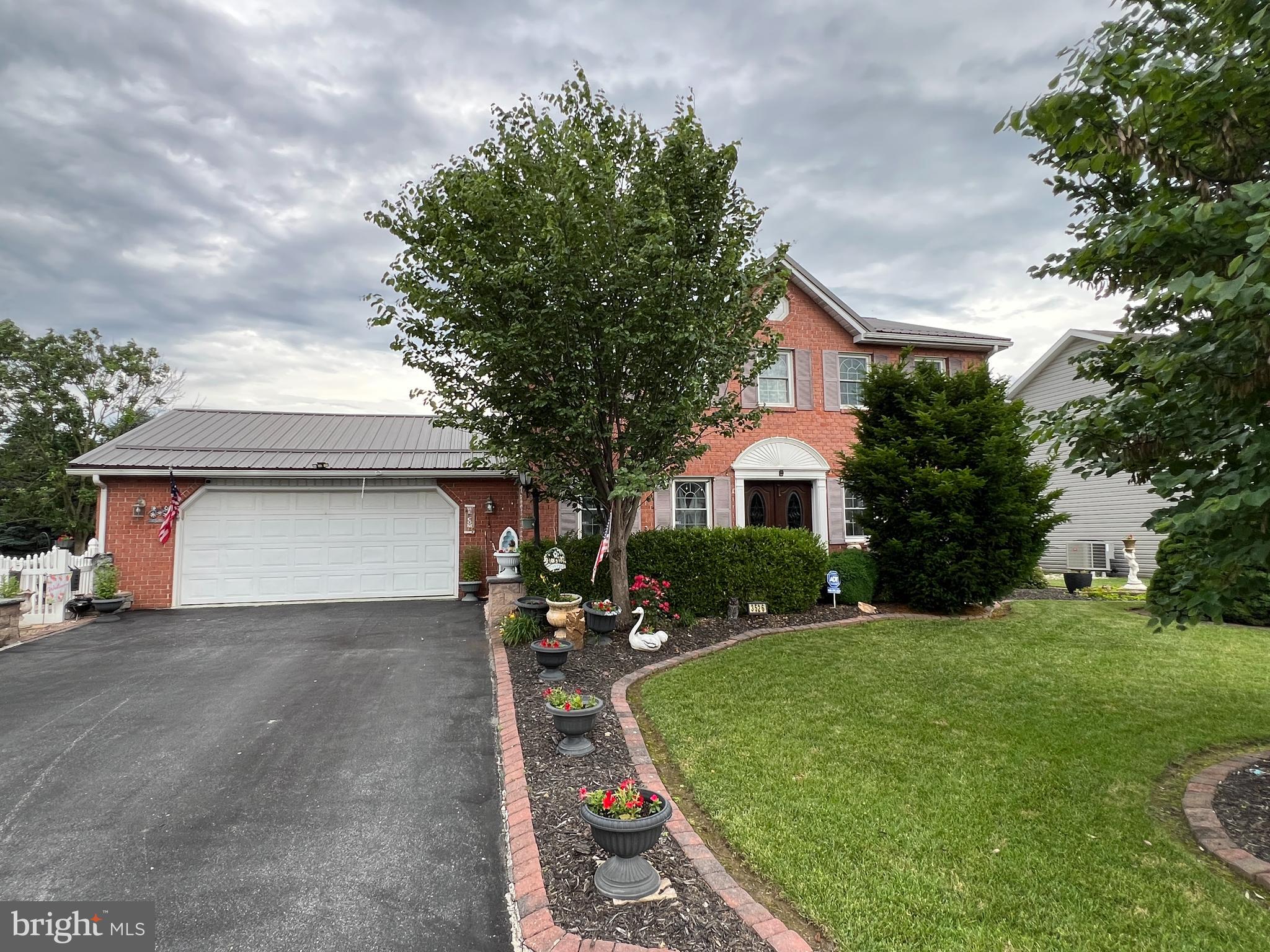 Look no further! This home has it all. Updated kitchen that leads to a large sunroom with a second kitchen and a heated in-ground pool! Beautiful tiled floors throughout the first floor. 4 nicely appointed bedrooms and 2 full updated bathrooms on the second floor. 2 gas fireplaces, one on the main floor and the other in the basement. Finished lower level has the laundry room, family room and plenty of storage! The extensive hardscaping/garden and pond area is truly an oasis that relaxes you the minute you see it! Located in Scot-Greene Estates minutes to shopping areas and other local amenities. Schedule your private showing today!