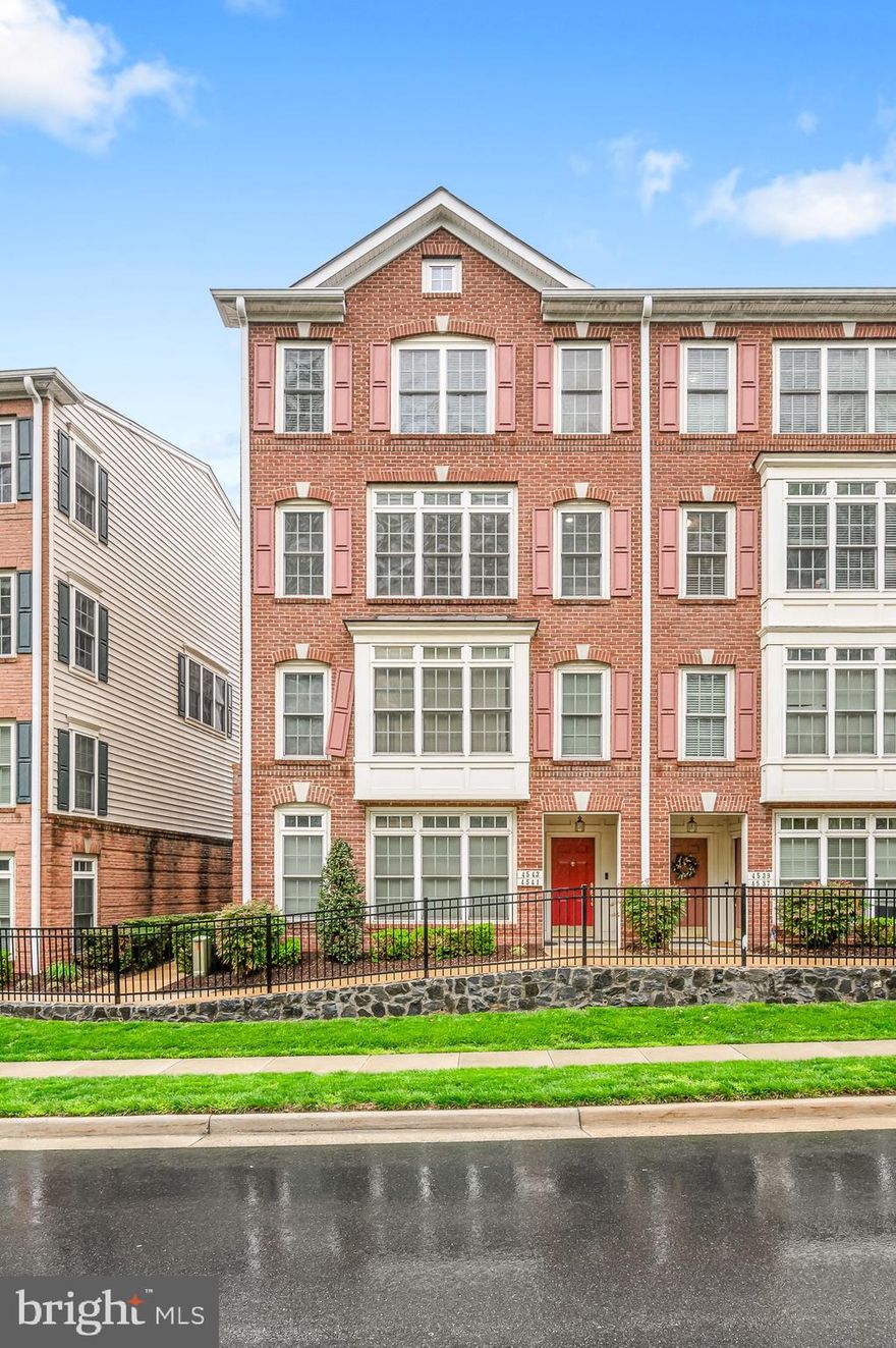 This large and beautiful end-unit townhome with 3 bedrooms and 2.5 baths in a prime Fair Oaks location features a convenient 1-car garage and driveway with plenty of visitor parking. Perfectly situated within walking distance to Fairfax Corner, a quick two-minute drive to Fair Oaks Mall, and surrounded by parks and trails, it's ideal for balancing work and leisure.  Enjoy easy access to Tysons Corner and DC. Inside, abundant windows fill the home with natural light. The open floor plan features high ceilings and a gourmet kitchen with granite countertops, an island with bar seating, and stainless steel appliances—including a brand-new stove (2025), dishwasher (2022), and refrigerator (2021). Beautiful bamboo  flooring flows seamlessly throughout the spacious kitchen and adjoining family room, which features a cozy gas fireplace. The expansive living and dining areas provide ample space for gatherings, with a convenient home office nook thoughtfully positioned adjacent to the living room. The upper level offers a convenient laundry with a large-capacity washer and dryer and spacious bedrooms. The primary suite has a huge walk-in closet with a window, and a luxurious bath featuring dual sinks, soaking tub, and separate shower. Additional highlights include a new 80-gallon water heater (installed November 2023) and ample storage space in the finished under-stair area on the lower level. The rear-entry garage offers abundant cabinetry and storage solutions. Move-in ready—don't miss this incredible opportunity!“Community amenities include the clubhouse, gym, and swimming pool”.