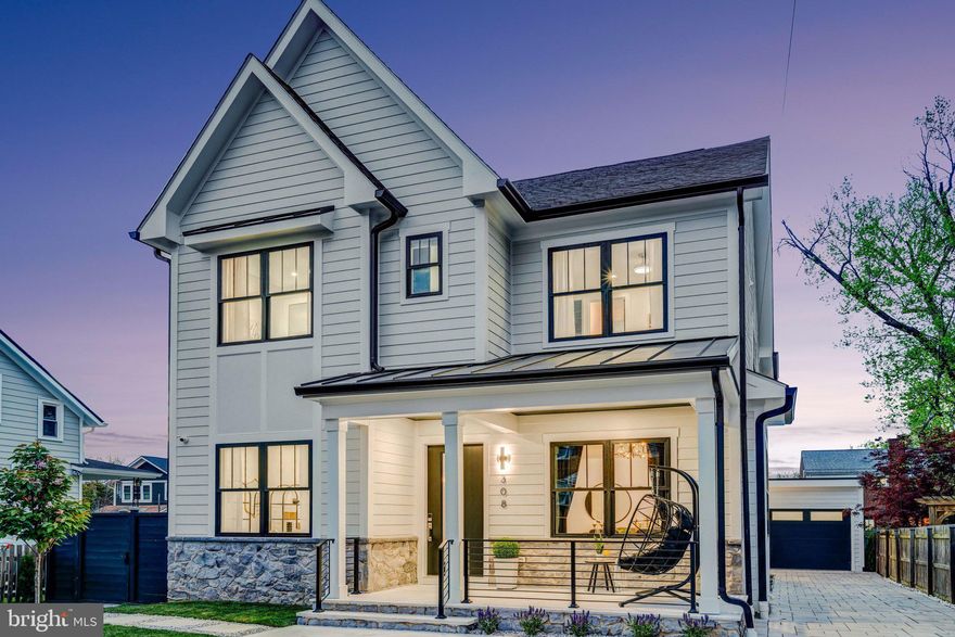 Welcome to this stunning new construction in the heart of coveted Del Ray — Alexandria's most sought-after neighborhood, beloved for its tree-lined streets, vibrant "Avenue," and walkable, small-town feel just minutes from DC. This home delivers sophisticated design and effortless livability across three finished levels.
Step onto the charming stone front porch with marble floors — perfect for morning coffee or an evening with neighbors — and into a main level featuring a formal dining room with designer lighting and a tray ceiling, and a study/optional 6th bedroom with an adjacent full bath. The gourmet kitchen impresses with a quartz waterfall island, custom hood, Sub-Zero refrigerator, Viking range, Wolf drawer microwave, Miele dishwasher, and pot filler. A walk-through wet bar connects to a walk-in pantry with custom floor-to-ceiling woodwork and pull-outs. The family room opens through completely retractable glass doors to a covered porch with a fireplace — true indoor-outdoor living. White oak hardwood and a main-level full bath complete this floor along with a mud room that has rough-ins allowing for a second laundry if desired.
Upstairs, the primary suite offers a private balcony, two walk-in closets, and a spa bath with custom double vanity, dual shower heads, body sprays, and a soaking tub. Three additional bedrooms are served by a buddy bath and an en-suite full bath. Upper-level laundry adds everyday ease.
The walk-up basement features a lovely wet bar with paneled dishwasher and refrigerator, and a dedicated yoga/exercise room and  a bedroom attached to a full bath — ideal for guests or multigenerational living.
Additional highlights of this home include 2-zone HVAC, whole-home interior and exterior speakers with sound system, security cameras, a Tesla charger in the oversized detached garage, and a fully fenced backyard for pets.