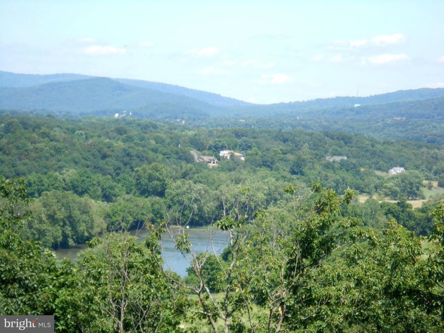 Priced to sell! Beautiful 5 acre lot at end of the road for complete privacy!  Partially wooded, has a well installed, drive-way. River views & beautiful mountain views! Electric available. Covenants rec'd.allow motor home for part of the year. Great investment for rec use or to build your dream home in the country & enjoy the views. Perfect place to Relax!!!