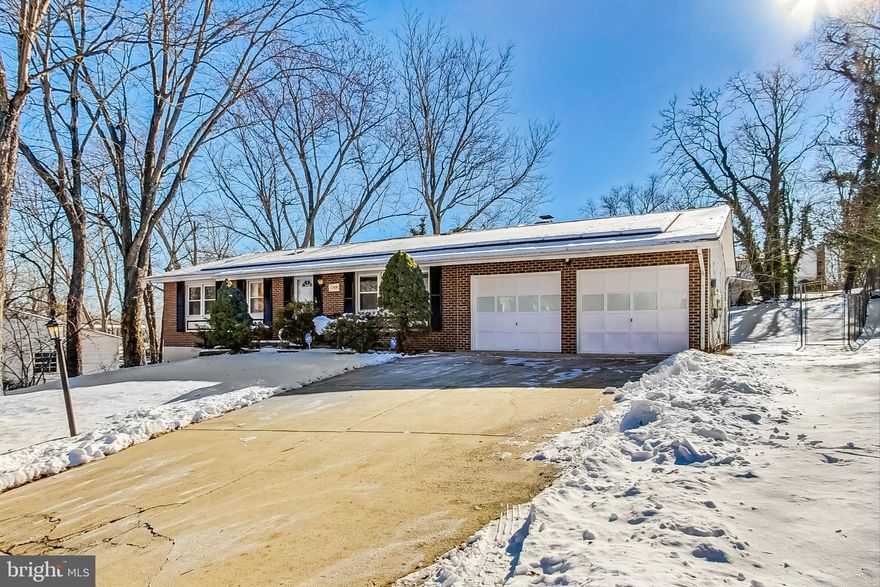 Welcome Home to your cozy rambler nestled in a quiet community that is close and convenient to everything.  Your kitchen has been renovated with New Cabinets, New Stainless Steel Appliances, Granite Countertops and Tile Floors. Your Washer & Dryer is conveniently located on the main floor of your home and there are Hardwood floors throughout. Enjoy quiet time on your covered back porch or in the spacious back yard. There is plenty of parking available in your oversized 2-Car Garage, in the wide driveway and even more parking is available in front of the home as well. Enjoy all the benefits of a State of the Art Solar System along with Energy Efficient appliances. You will love your Fully Finished Basement that has interior and exterior access and includes the 4th Bedroom, Recreation Room, Wood Stove Insert, and a Powder Room as well. Don't Delay, Come and Visit Your New Home, Today!!