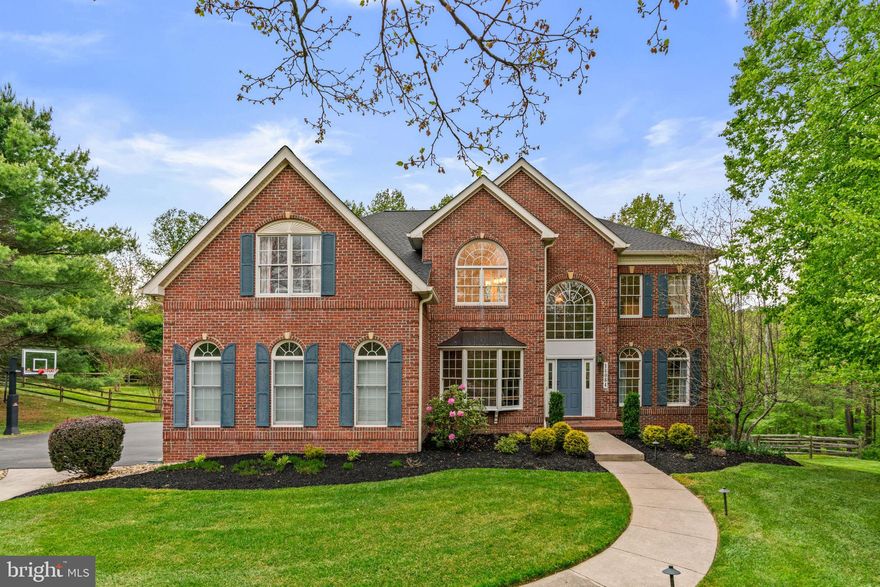 Welcome to this spacious and beautifully appointed 5-bedroom, 4 full bath, 1 half bath home with a 3 car garage, offering the perfect blend of comfort, functionality, and outdoor living. The owned solar panels will dramatically reduce/eliminate your electric bills and a whole house generator will make sure you are never without power. Nestled on a generous lot, this home features expansive living spaces ideal for both everyday living and entertaining. Enjoy seamless indoor-outdoor living with a large backyard, screened-in porch, deck, and patio — perfect for relaxing evenings, gatherings with friends and family, or enjoying the peaceful surroundings. Inside, you'll find generously sized bedrooms, multiple living areas, and a thoughtfully designed layout providing ample space for everyone. Originally built by toll brothers, the new updates include (but not limited to) new roof (2025), New Quartz counters (2026), New water heater (2024), New LVP flooring in basement (2026), New fixtures in bathrooms (2026). 
The main flood boast hardwood floors throughout, a large office, siting room, dining area, gourmet kitchen, half bath, laundry room, and a massive living room with vaulted ceilings, tons of windows and fireplace. The top floor includes a large primary suite with sitting room, walk in closet, and spa-like bathroom. In addition to the primary, you have 3 large bathrooms, with 2 of them being connected by a jack and jill full bath and an additional bedroom  with ensuite full bath. In the basement you have an additional bedroom, full bath, wet bar with fridge, a large living/entertaining space with fireplace, and tons storage space. The basement is a walk-out to the back patio making it the perfect entertainment space or for guests/in-laws. 
This home will not last, so make an appointment to see it today!