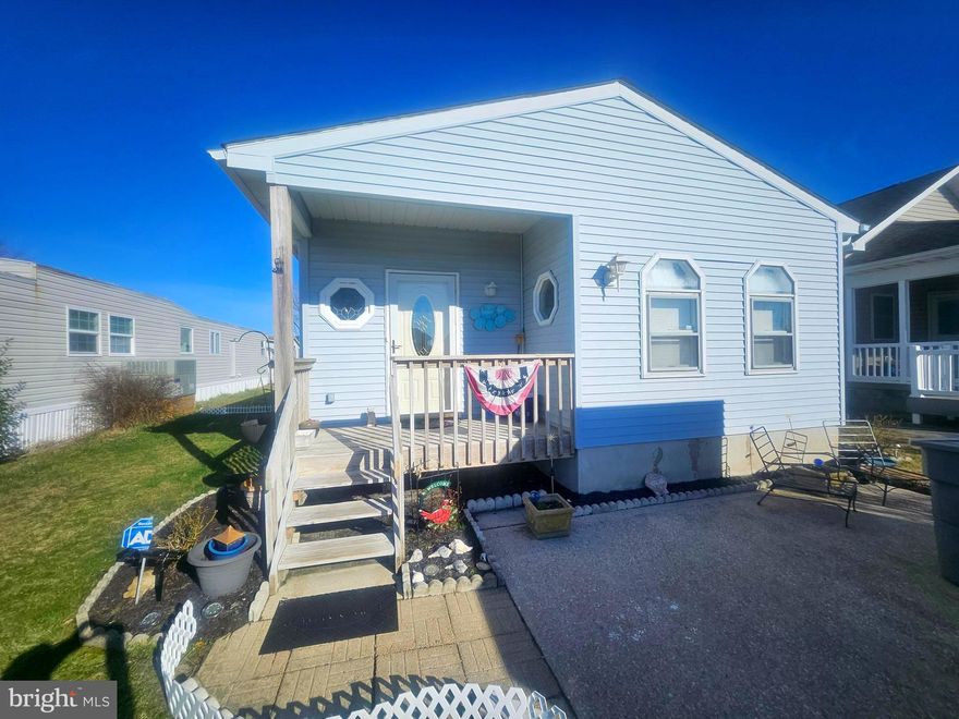 Welcome to the highly sought-after Montego Bay community in North Ocean City! Enjoy everything OCMD has to offer while owning this  3 bedroom 2 full bath home.  Front Bedrooms have a Jack and Jill full bath. You will love the wide open floor plan. There is also a covered back porch for relaxing after a day at the beach or pool.  This vibrant neighborhood offers the perfect blend of coastal charm and resort-style amenities. Located just blocks from the beach and a beach bus ride away to Ocean City's famed boardwalk. Montego Bay features a vacation-like atmosphere with unbeatable convenience whether you are looking to be a full time resident or own a 2nd home get-away. Residents enjoy two outdoor pools, tennis courts, a scenic boardwalk along the bay, a nine-acre wildlife sanctuary, and a picturesque pond with walking trails. The community also offers shuffleboard courts, a mini-golf course, and a full-service community center. Montego Bay Civic Association has low HOA fees at $385/Year. Whether you're boating on the bay, relaxing by the pool, hanging out on the beach, enjoying dinner at one of the nearby restaurants, you'll love calling Montego Bay your home.