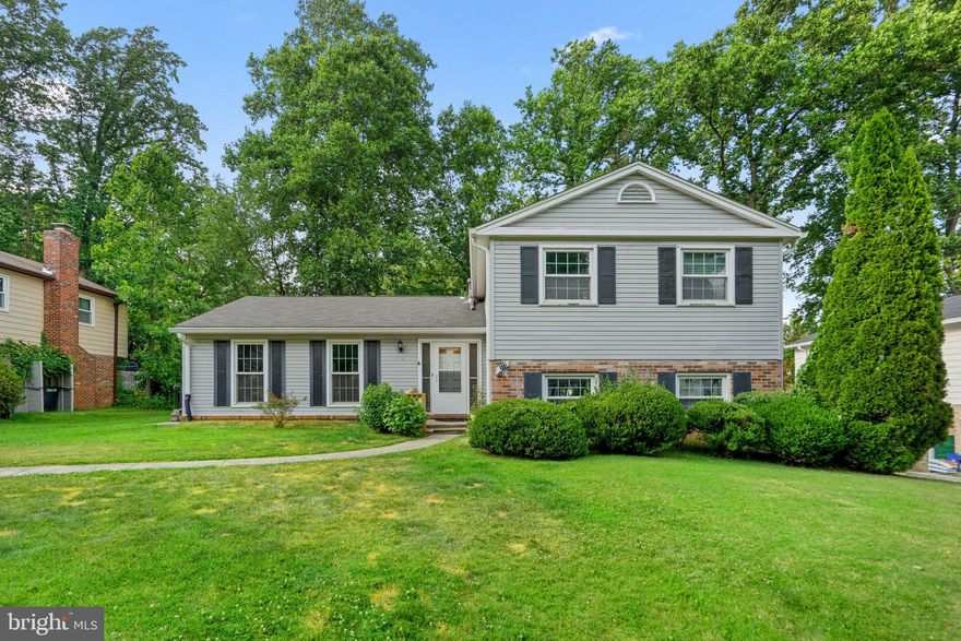 Stop the search! This adorable split level is the one you've been waiting for. A formal foyer welcomes you home where you have more spread-out space than you could imagine! The main level features a large eat-in kitchen, spacious dining room, and living room. The kitchen features granite counters, and is flooded with natural light with tons of windows and sight lines to the backyard and family room! Upstairs you have three large bedrooms and two full baths. Down one level from the kitchen you will find the family room with sliding doors opening to the back patio and yard, a 4th bedroom, half bath, and laundry! But wait, there's more! Don't miss the full basement with walk-up stairs to the side yard! All nestled on a gorgeous flat lot on a quiet street, just minutes to shopping, dining, and major commuter roads. You won't want to miss this one, so call us to schedule your private showing today!