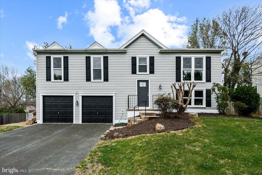 WELCOME HOME!  CHARMING Bilevel with 4 bedrooms and 3 full baths is sure to PLEASE!  OPEN & SPACIOUS Main Level provides ample room for comfortable living. Natural light floods the main level, highlighting the newly refinished wood floors and bright and airy kitchen.  Main Level Sliders open to a deck that has enough space to HOST COOKOUTs for all your FAMILY & FRIENDS.   Lower Level has Large FAMILY ROOM & COZY fireplace for those colder days.  Additionally the LOWER LEVEL includes the 4th bedroom and 3rd full bath.  HIGHLIGHT REEL continues with fully fenced in large yard, freshly painted deck, New Carpet, Paint refreshed throughout home, and so much more.   IDEAL location is close to Route 1 & 1-95, only minutes to Grocery & shopping centers or a short drive to Downtown Fredericksburg Eateries & shopping. Centrally located to DC or Richmond. FAVORITE this HOME SWEET HOME today and schedule your showing!