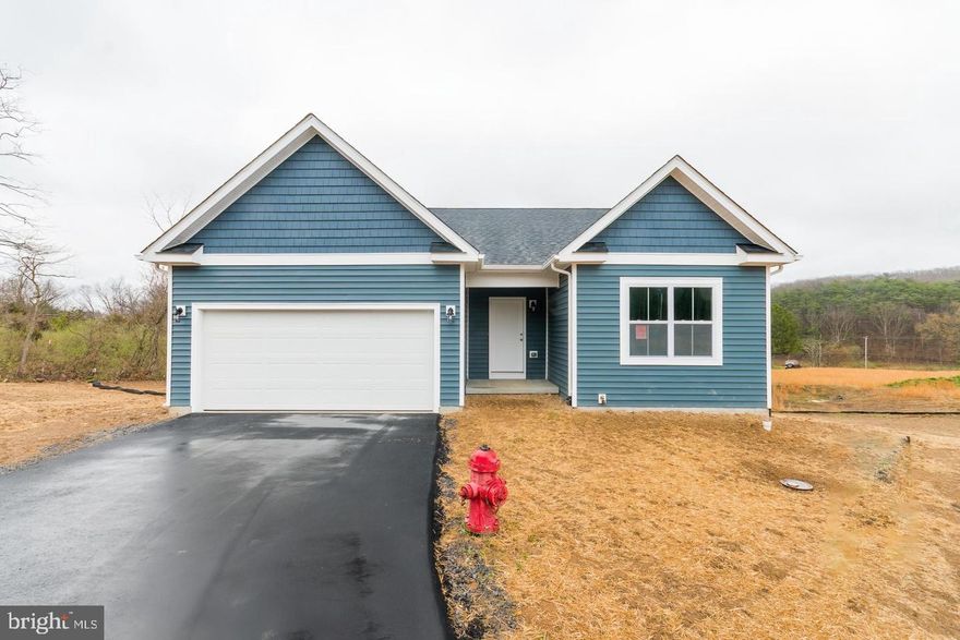 New construction. Minutes from downtown Berkeley Springs & Cacapon State Park . This to be built-  3 bedroom, 2 full bath ranch home. White cabinets and Stainless Steel kitchen appliances consisting of Refrigerator, Electric Range, Dishwasher & Microwave are included. Granite counter tops are standard with this model along with other nice standard features. Paved driveways for each home. No construction loans are needed. Your lender letter and deposit is all it takes to move forward. Some Photos are of similar construction