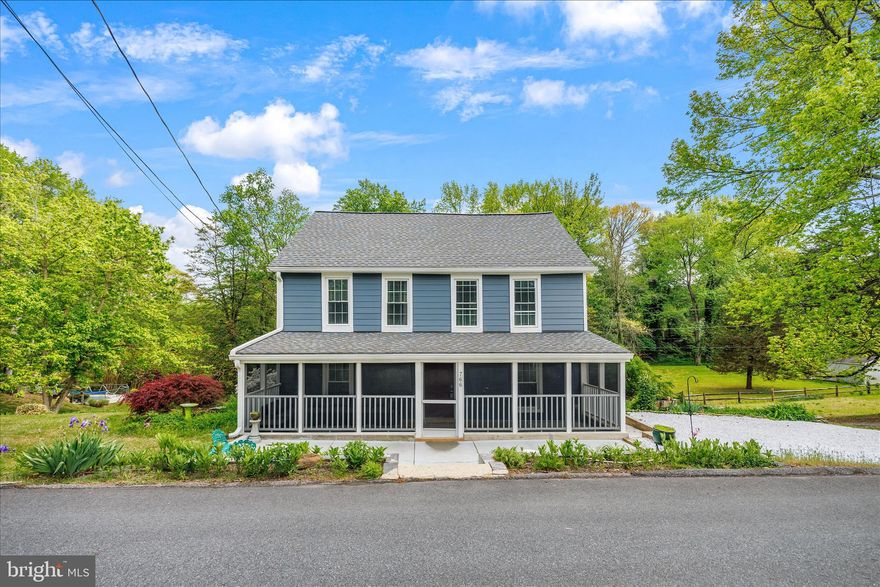 Welcome home to this charming historic property, built prior to 1900 and situated in the heart of Arnold. A newly added entry patio and inviting screened porch set the tone, offering the perfect place to relax and welcome guests.

Inside, timeless character shines with original hardwood floors flowing through the expansive living and dining areas. The dining space features built-in shelving, adding charm and function. The kitchen offers a large pantry and abundant shelving, perfect for storage and displaying your favorite pieces.  Beyond the kitchen you'll find a cozy sitting room and a spacious family room, creating flexible living spaces to suit your needs. The main level also includes a full bath, complete with a freestanding tub and classic black-and-white tile that blends historic charm with a style that feels effortlessly current.

Upstairs, a loft-style landing filled with natural light provides the ideal space for a home office, reading nook, or plant-filled retreat. Three bedrooms and a convenient powder room complete the upper level.

The unfinished basement offers excellent storage, laundry space, and walkout access to the backyard.

Set on nearly half an acre, the property provides a rare sense of space and privacy, along with seasonal water views of the Magothy River. Conveniently located near local parks, marinas, shopping, and commuter routes to Annapolis, Baltimore, and D.C., this home offers a unique opportunity to own a piece of Arnold’s history with room to make it your own.