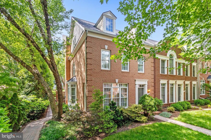 OPEN HOUSE, Sunday June 1st 1pm-3pm! Prime location and rarely available, this end unit & Hardi-Plank townhome offers the space and comfort of a detached home right in the heart of Falls Church City. Featuring hardwood floors on all levels, this beautifully maintained residence combines timeless design with modern upgrades. The sunlit main level showcases crown molding, a bay window, and a spacious living room that flows seamlessly into the kitchen, which boasts 42" maple cabinetry, granite countertops, a sitting area with a gas fireplace in the kitchen and ample space for entertaining. A finished bonus room offers the perfect flex space for a home office or guest room. The lower level includes a second gas fireplace, a convenient kitchenette, and two generous storage rooms—ideal for extended stays or multi-generational living. With a  built-in four-room speaker system, the home is designed for both comfort and convenience. Step outside to a private, enclosed brick patio—perfect for relaxing or hosting guests.  As you head upstairs, the tray ceilings in the primary bedroom and Elfa-custom made closets make for the luxury feel, with 2 closets and full primary en-suite. The finished two-car garage adds practicality, while major updates including a new HVAC system and roof in 2016 provide peace of mind. Located just one mile from both East and West Falls Church Metro stations, and close to the Falls Church Community Center, Cherry Hill Park, and the library, this exceptional home offers unbeatable access to everything Falls Church has to offer.