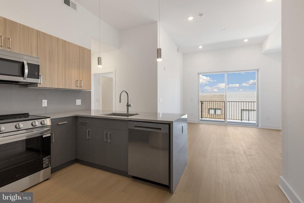 Photo of 1731 Tilghman Street #206, PHILADELPHIA, PA 19122 (MLS # PAPH2542978)