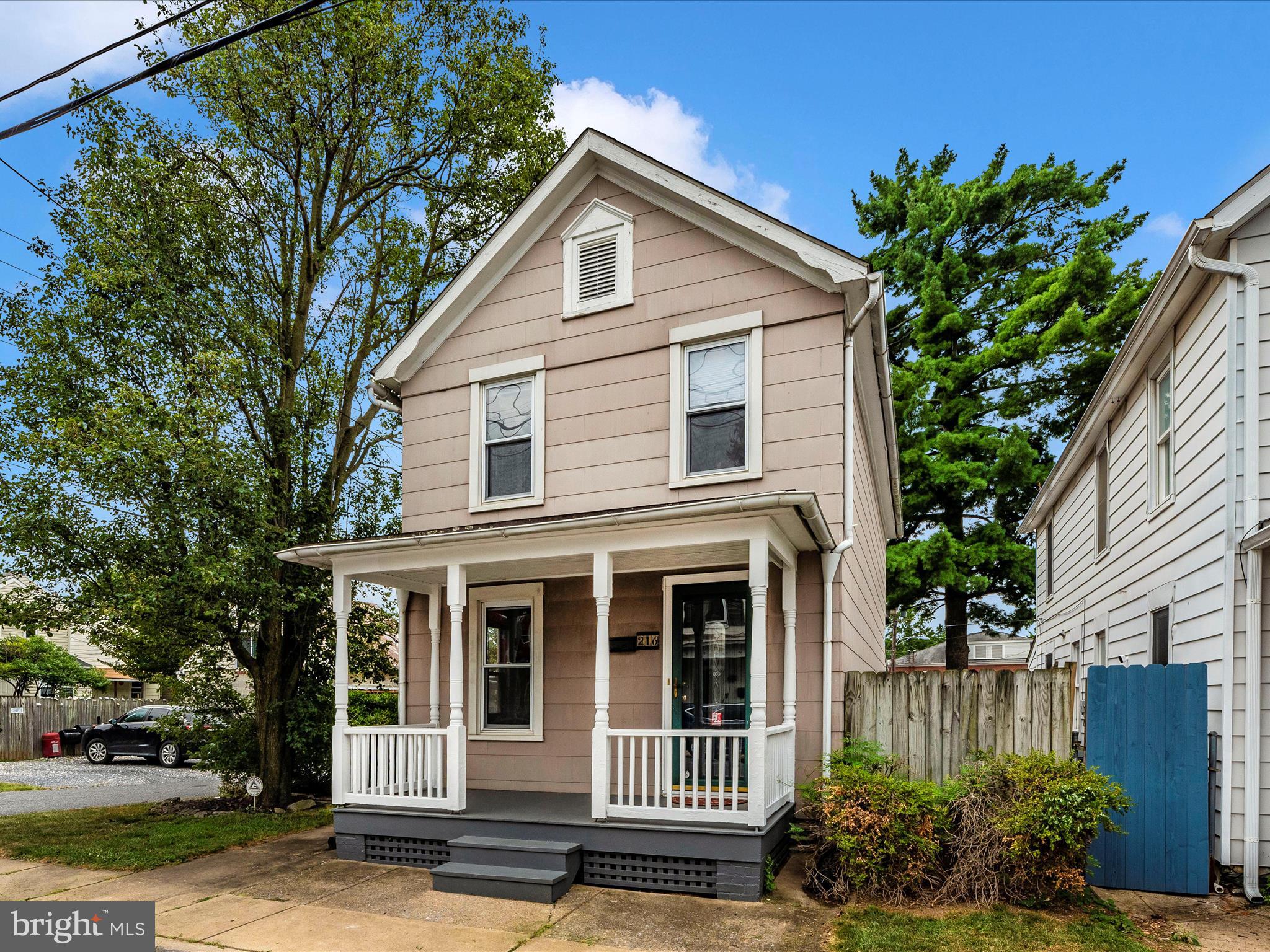 Welcome to W 5th St. A great opportunity to live and invest in Downtown Frederick! This charming 3 BR single-family home is situated on a corner lot in the heart of Historic Frederick MD. Located near major commuter routes with high walk score, close to dining, shopping, Baker Park, Hood College, Frederick Health, and all that Downtown Frederick has to offer. Here, you'll find all the space you need to call home and a wise investment. The first level welcomes you in with a well-maintained, freshly painted interior featuring hardwood floors, a naturally-lit family room, dining room and kitchen with a new refrigerator and stove. With 3 bedrooms and 1 full bath on the second level, you'll have ample space to relax, work from home and entertain! Covered porches off of both the front and back of the home will make outdoor living, entertaining and morning coffee all the more enjoyable! The private fenced backyard is perfect for gardening or those with pets. With two dedicated parking spots and additional on-street parking, you'll never have to worry about finding a place for your vehicles. Don't miss this great opportunity to call Downtown Frederick home!